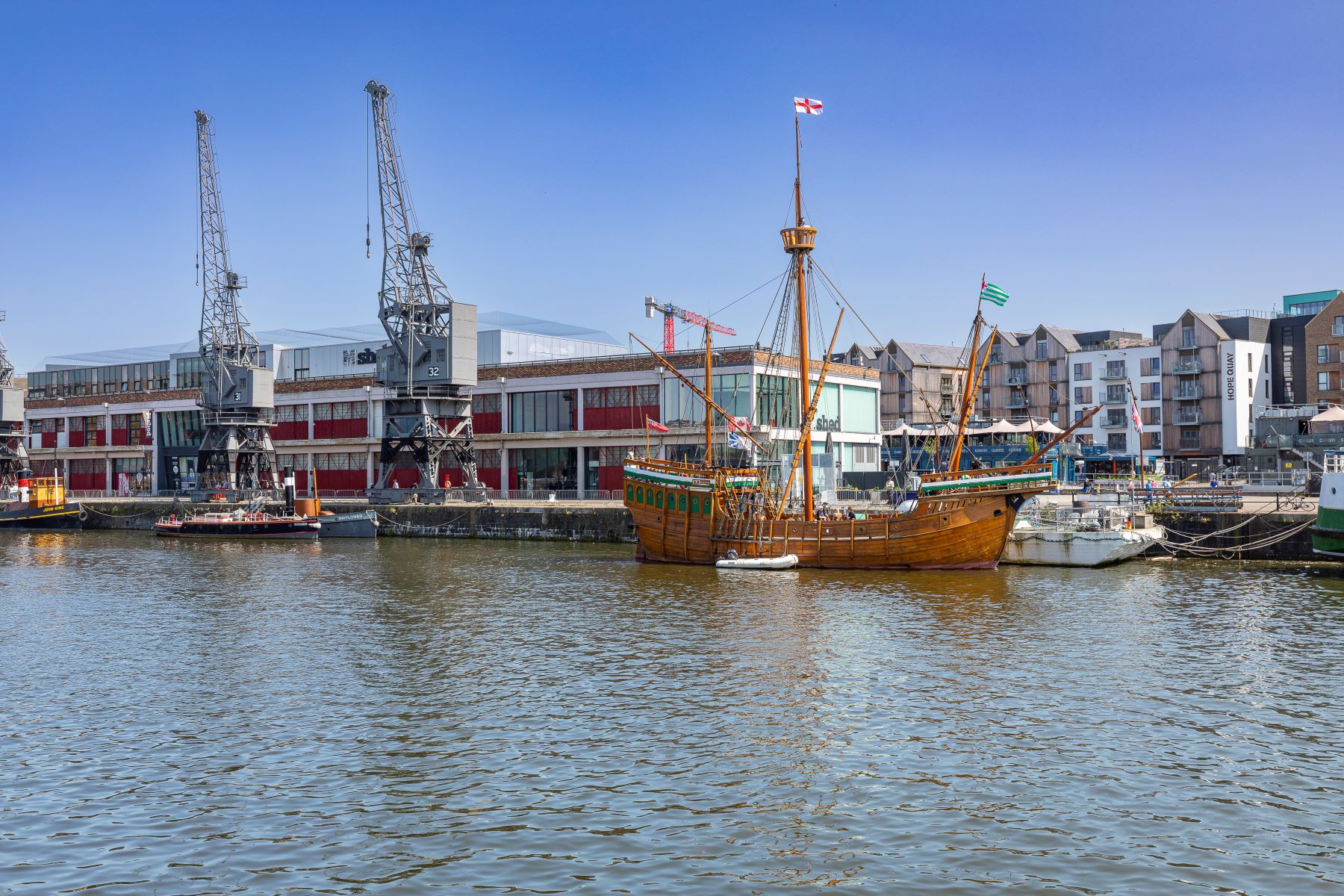 M Shed and Wapping Wharf with the Matthew Boat on Bristol Harbourside