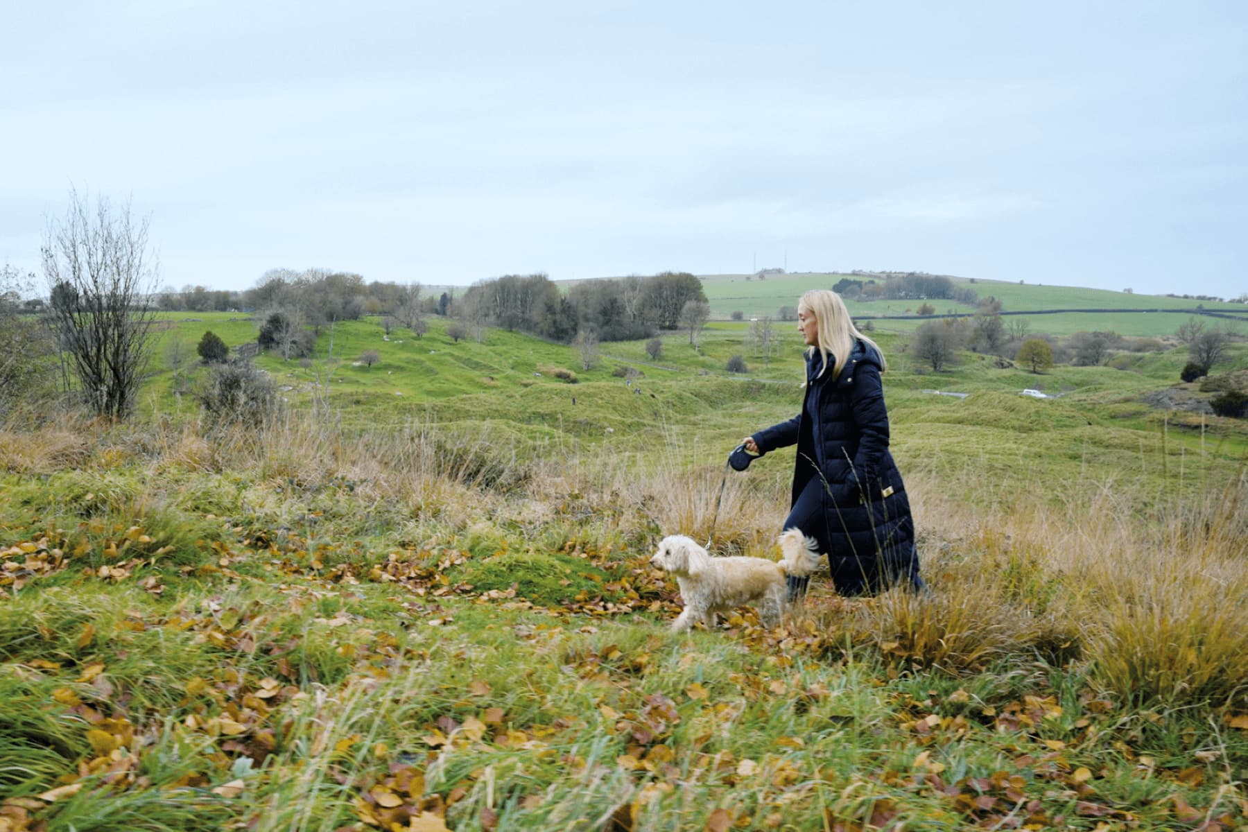 Woman and dog walking in mendip hills