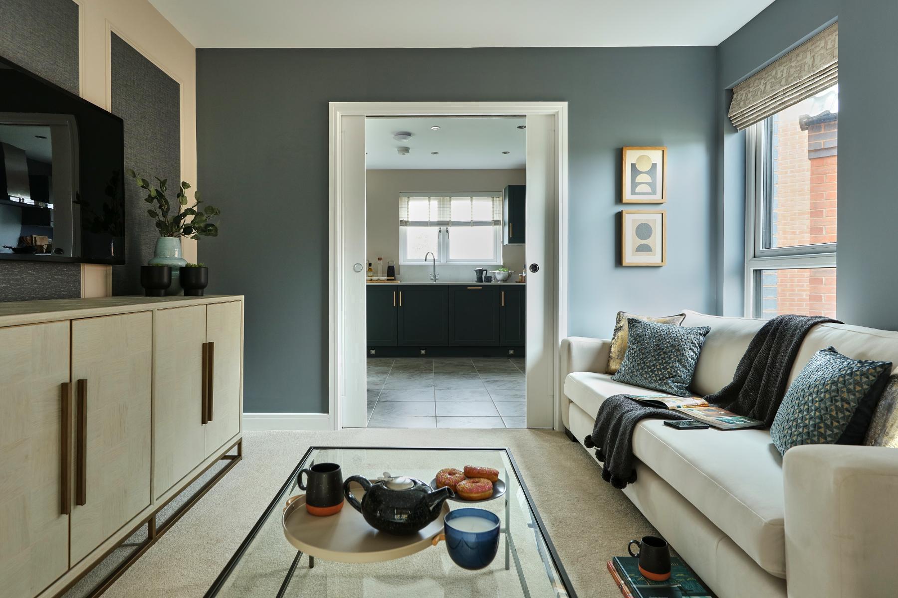 Living room with view of the kitchen