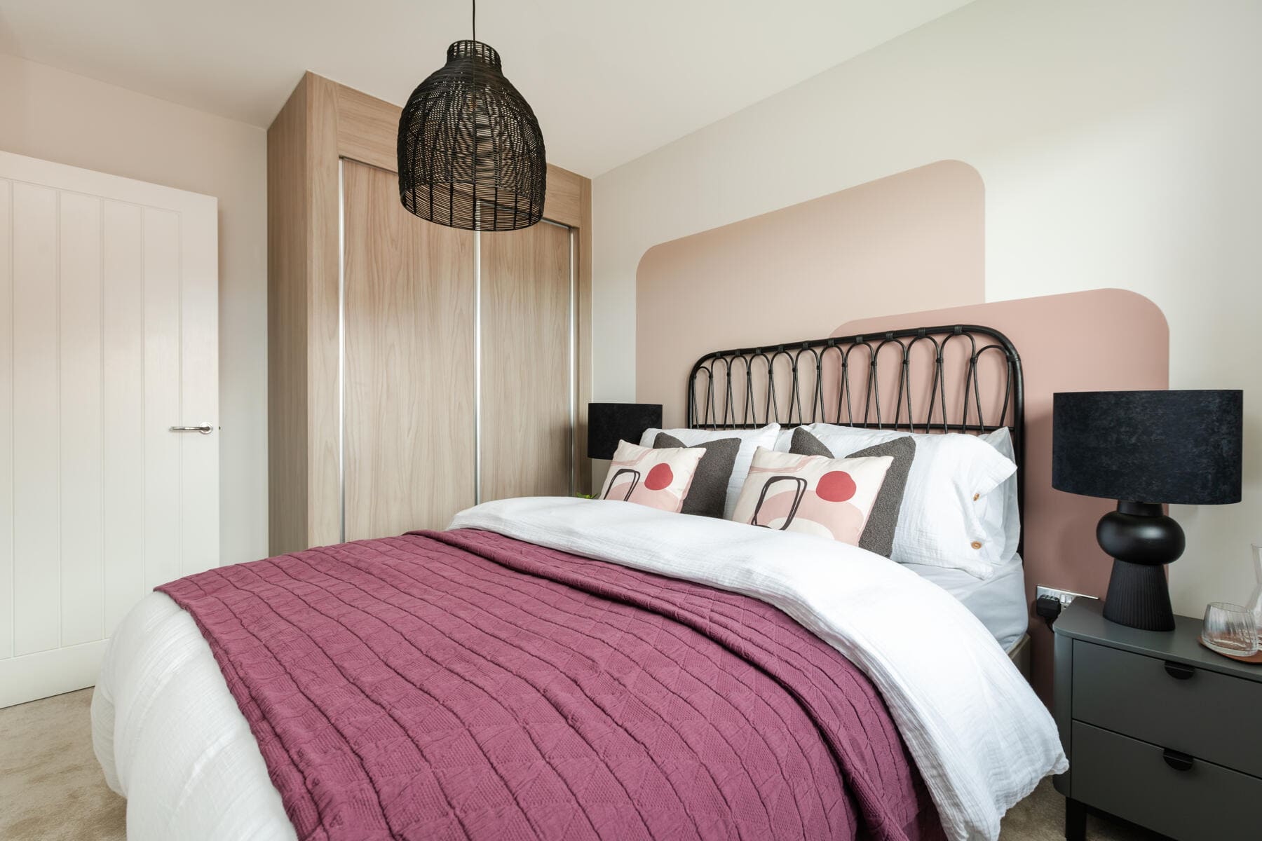 Double bed with wardrobes