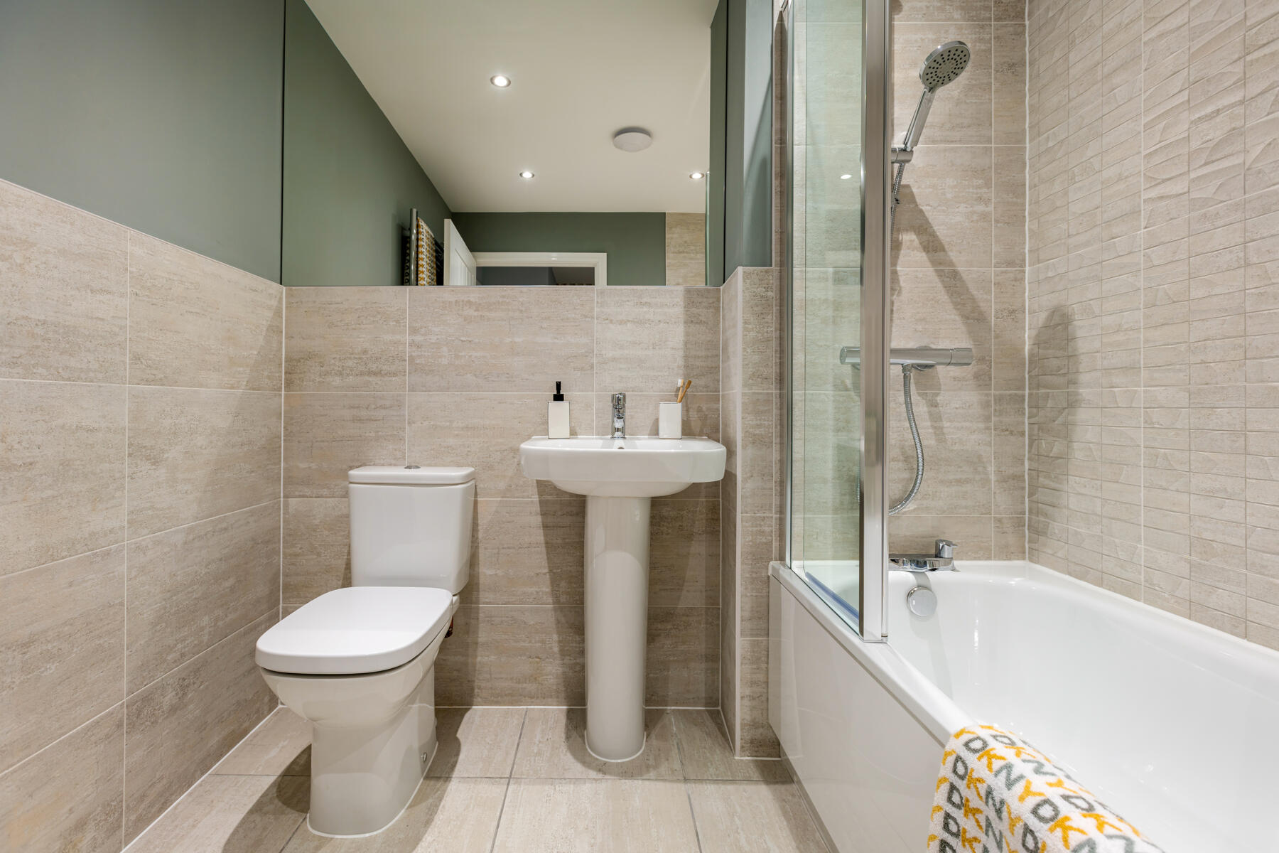 Bathroom with shower over the bath