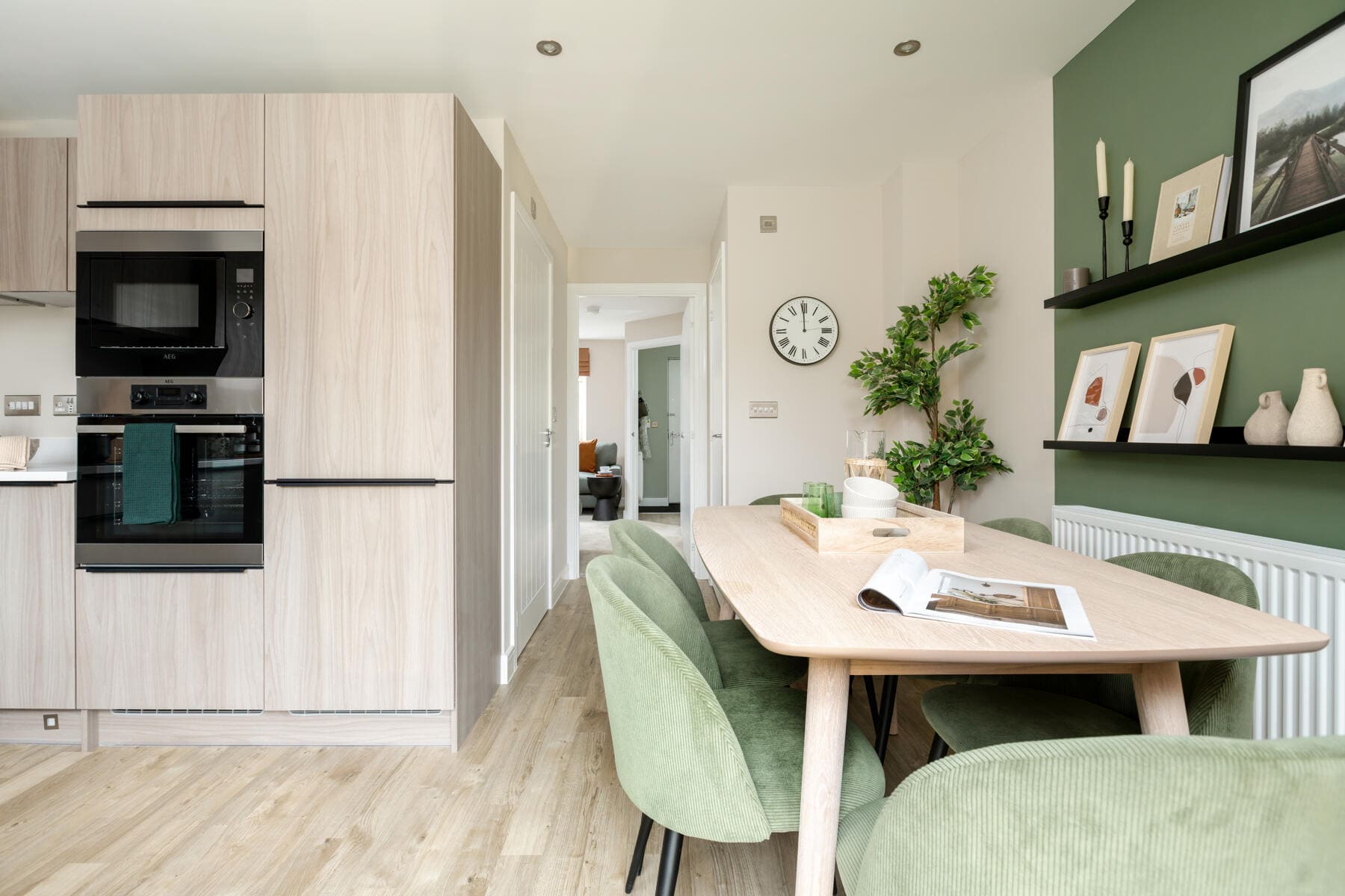 Dining table with kitchen oven housing 