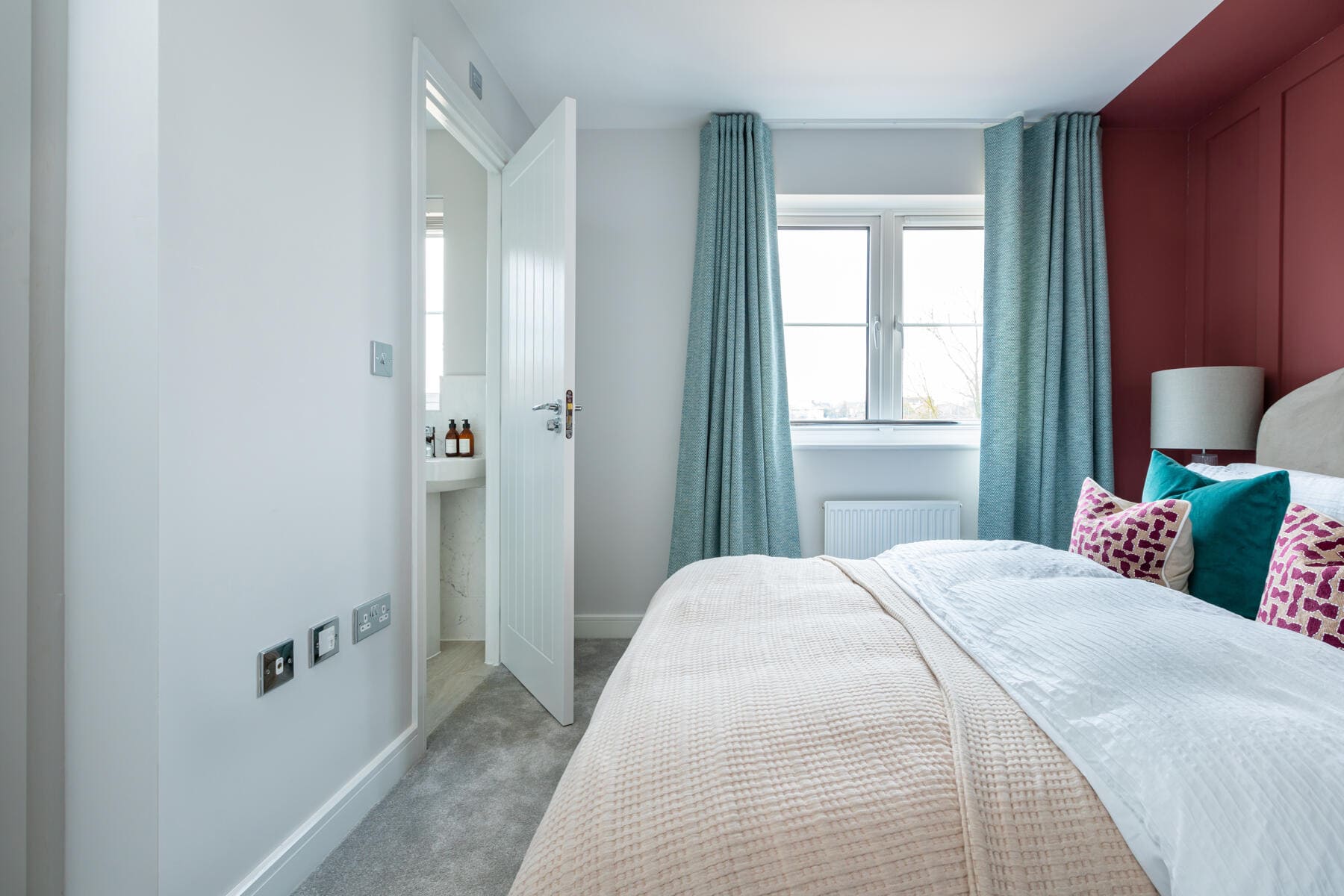 King-size bed in bedroom