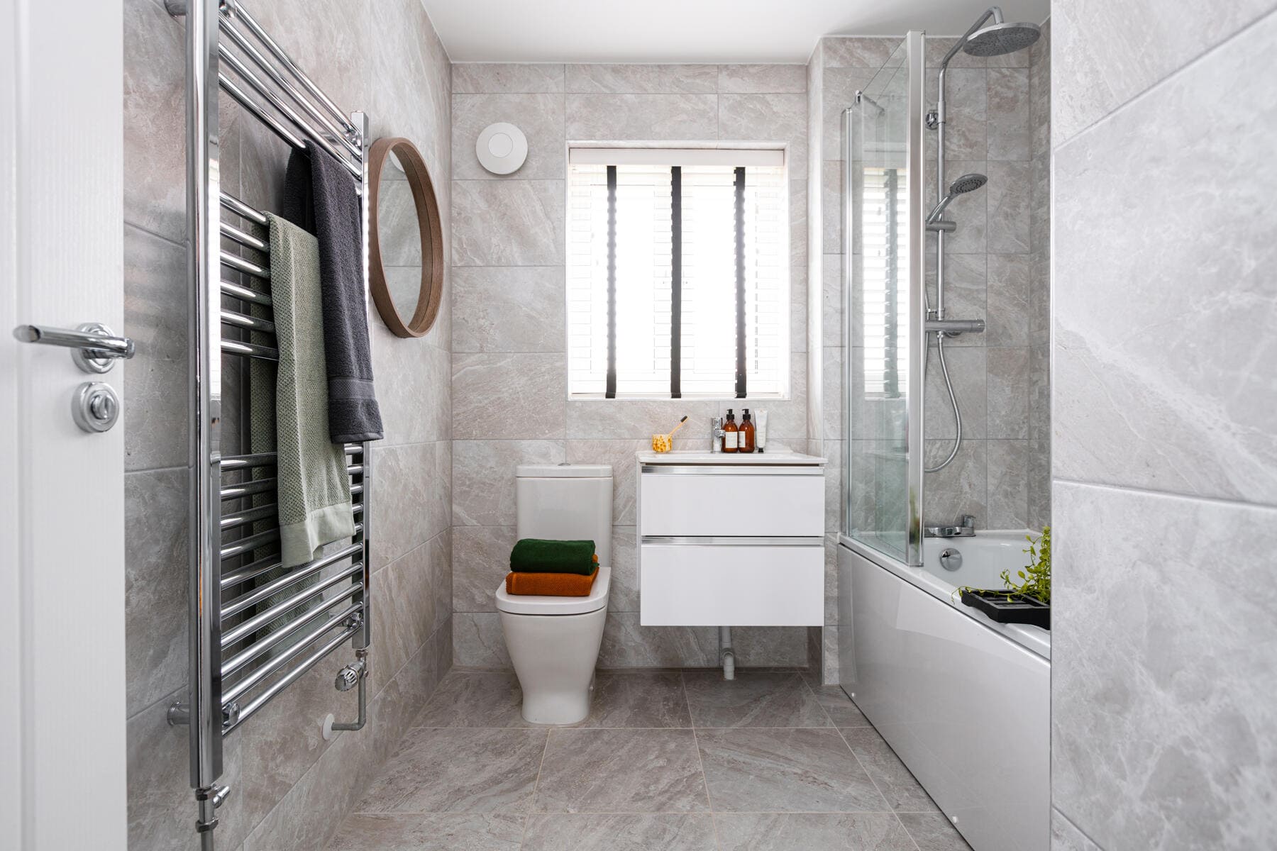 Toilet, vanity unit and shower