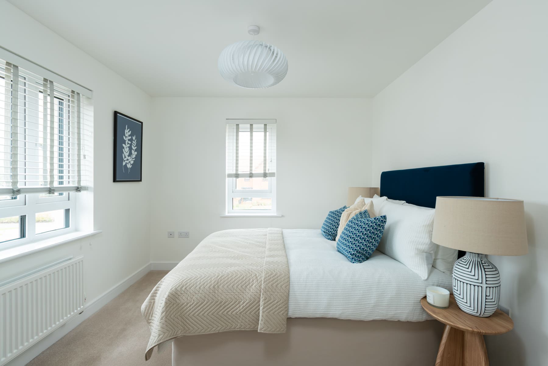 Double bed and bedside table with lamp