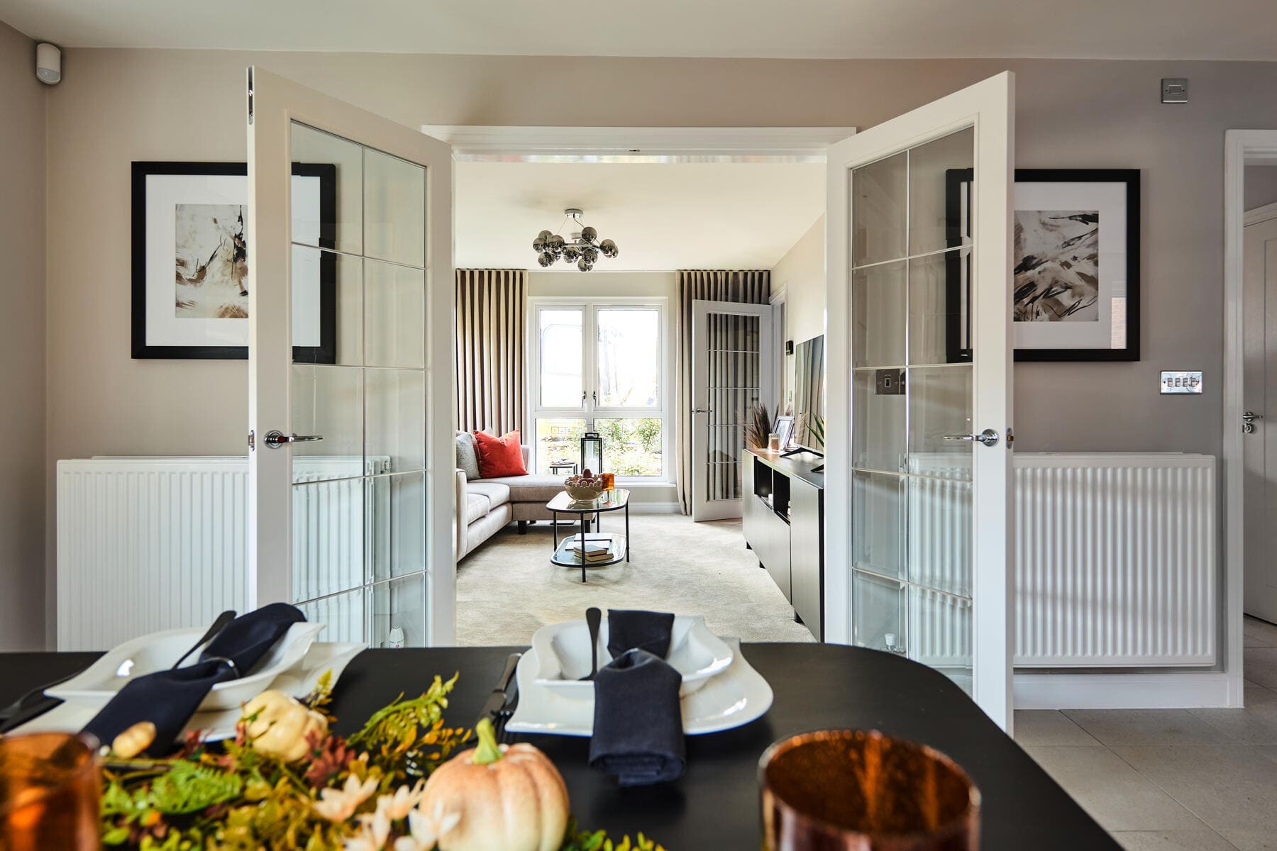 Dining table through to the lounge