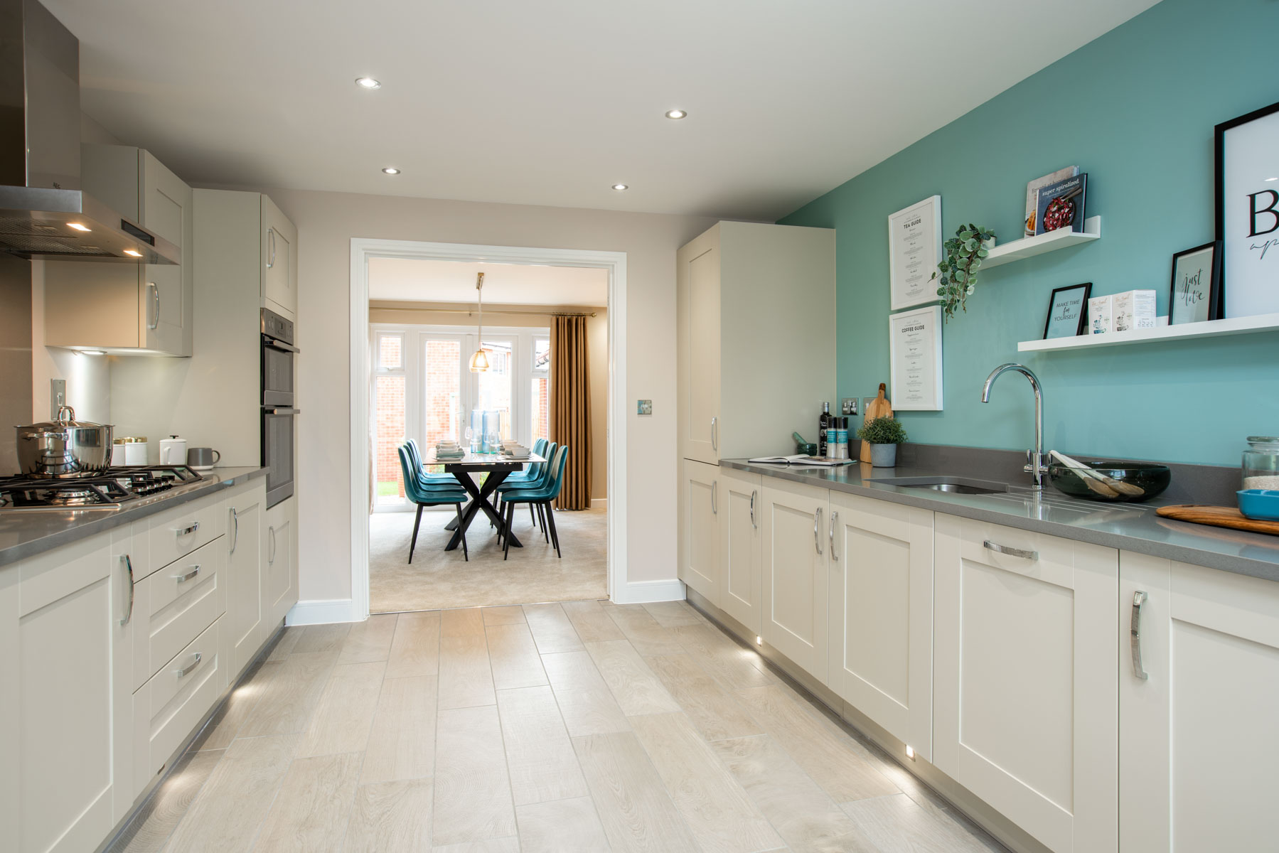 Kitchen with doors to dining room
