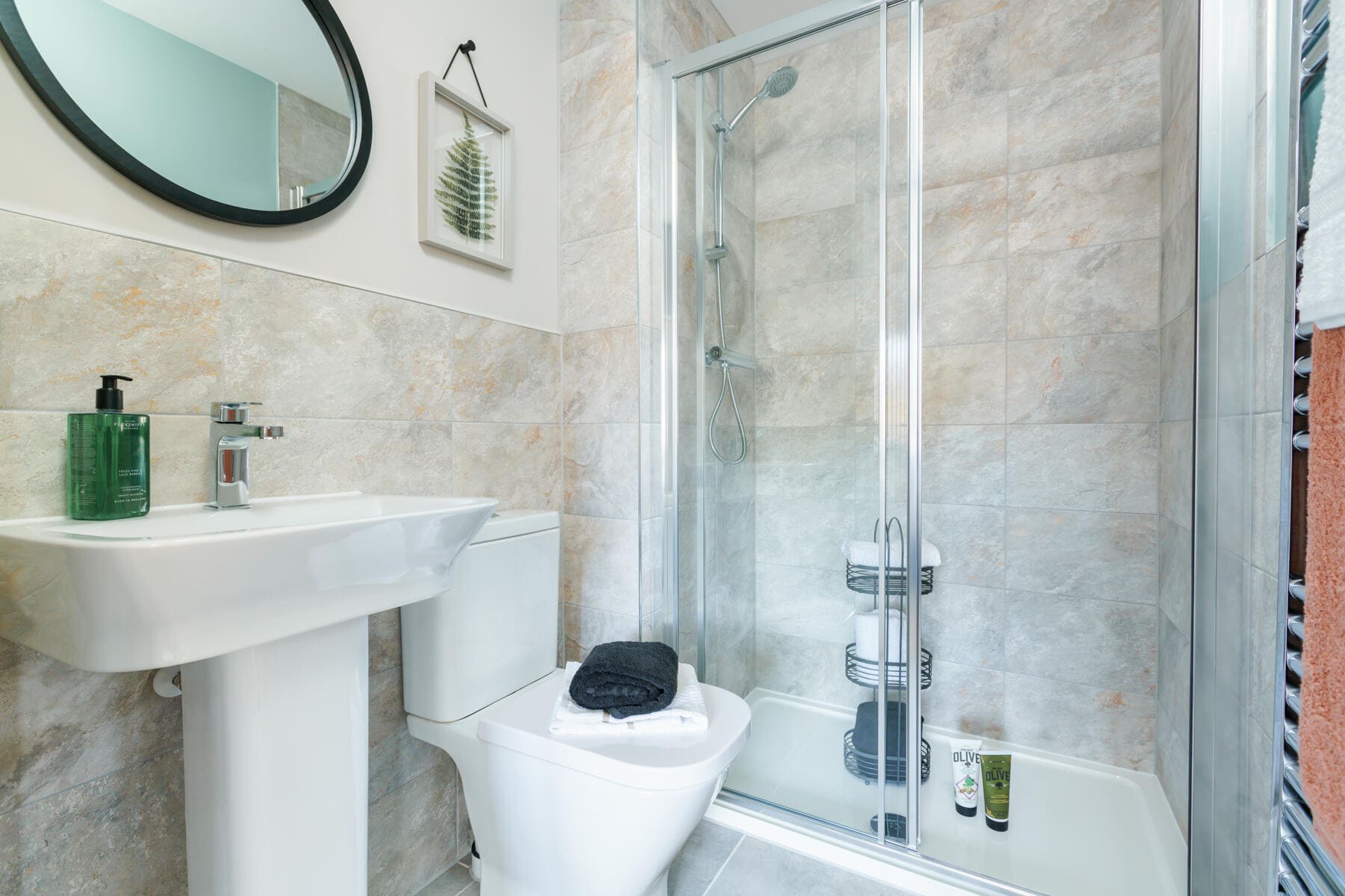 Shower over the bath with toilet and basin