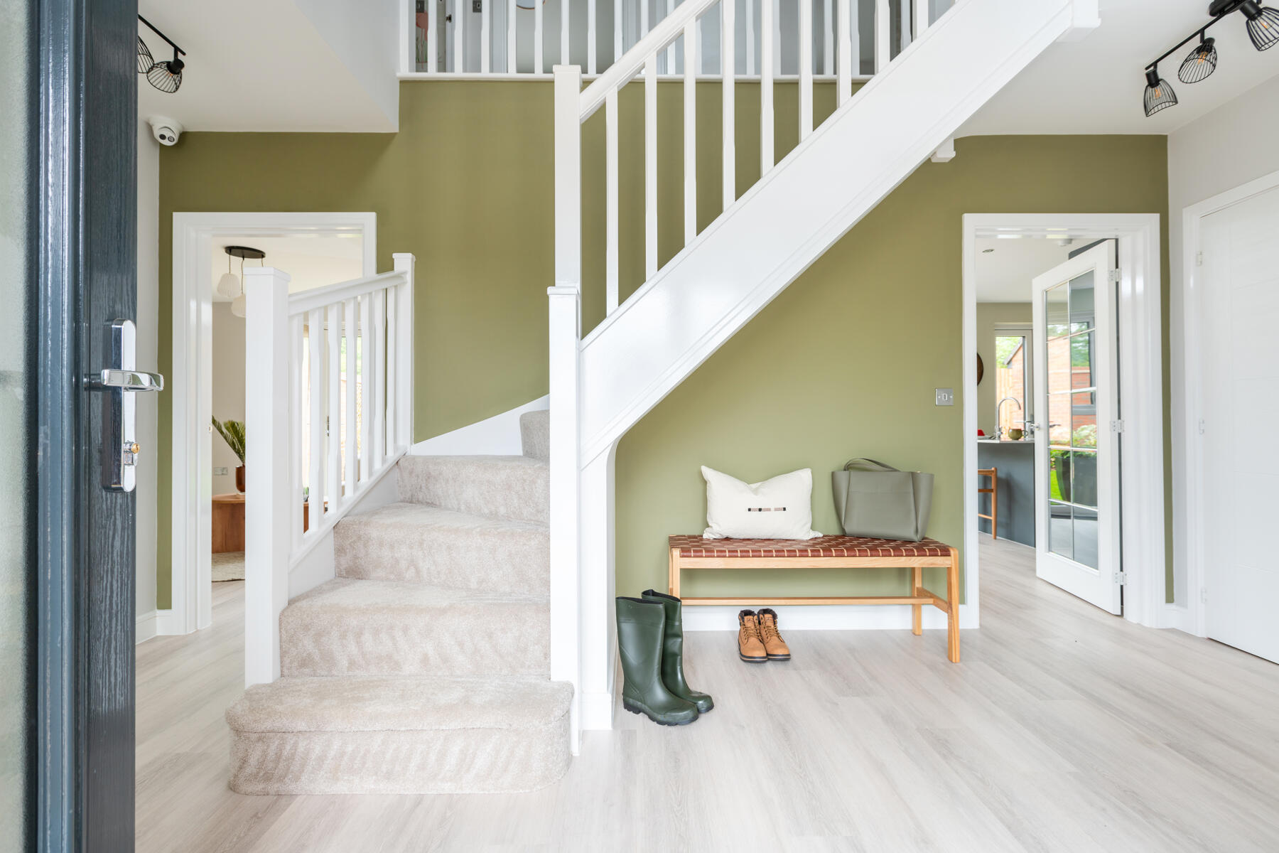 Stairs and bench in hallway