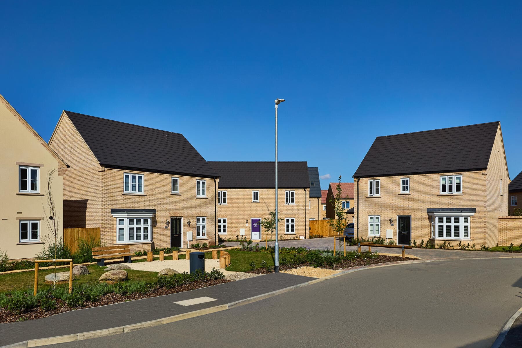 Street scene of homes at Burghley Green