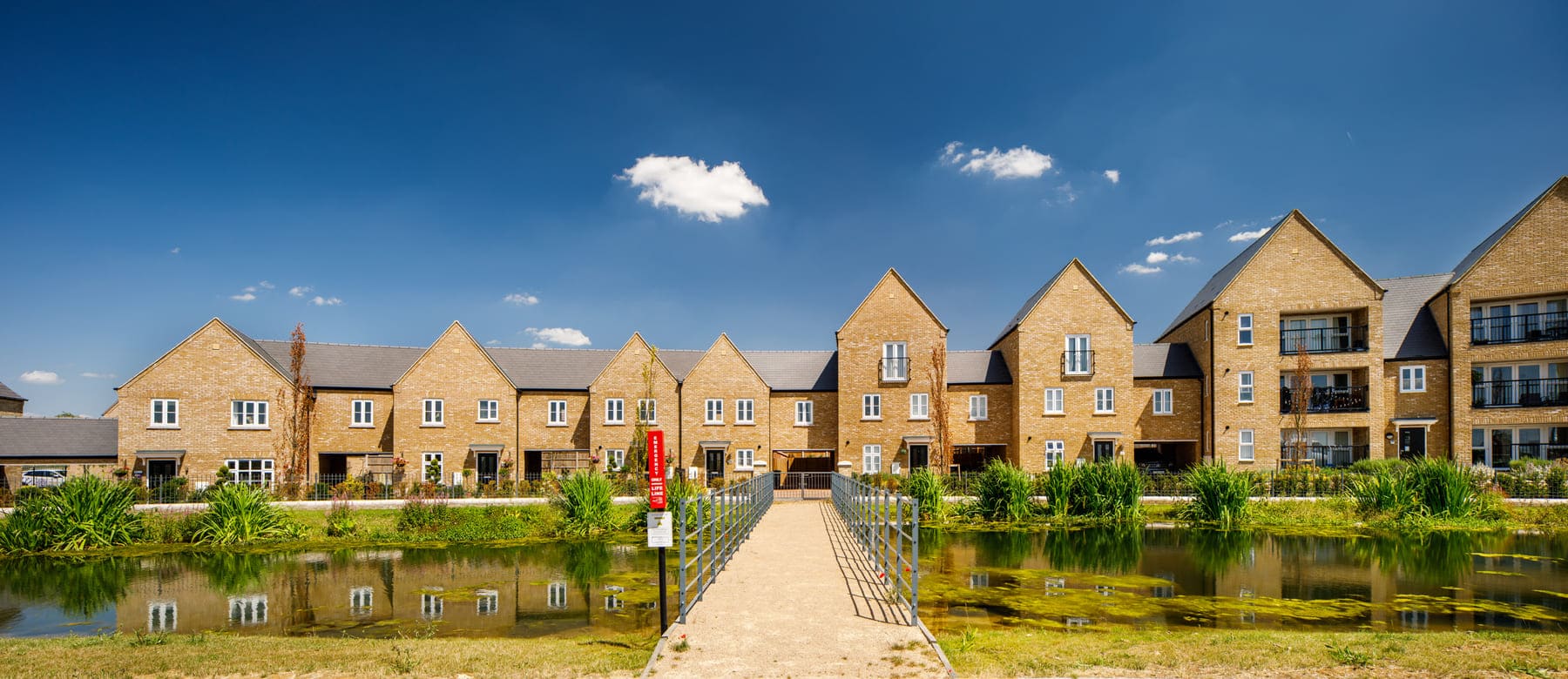 Houses with pond in front