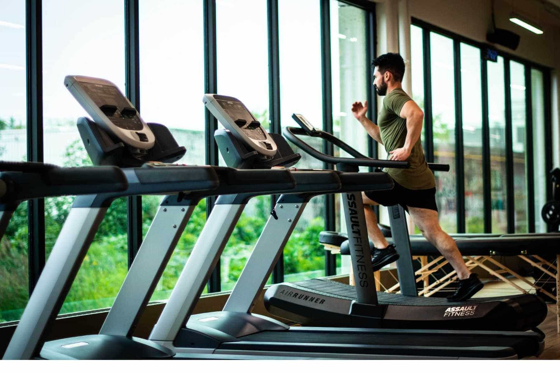 man on treadmill in gym