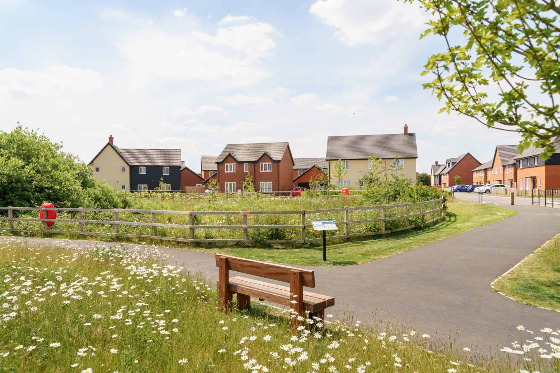 Heather gardens footpath and balancing pond street scene