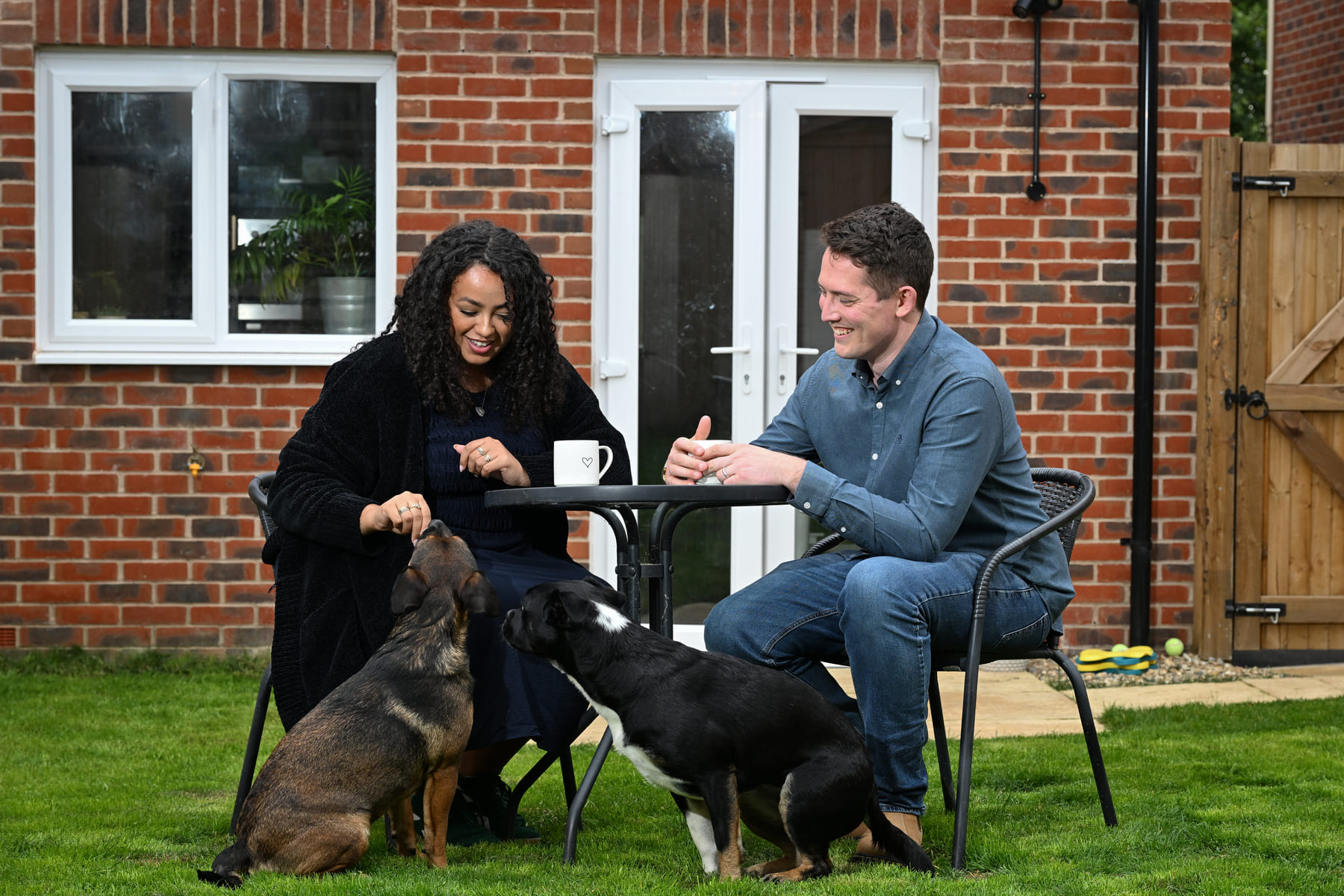 Man and woman with dog