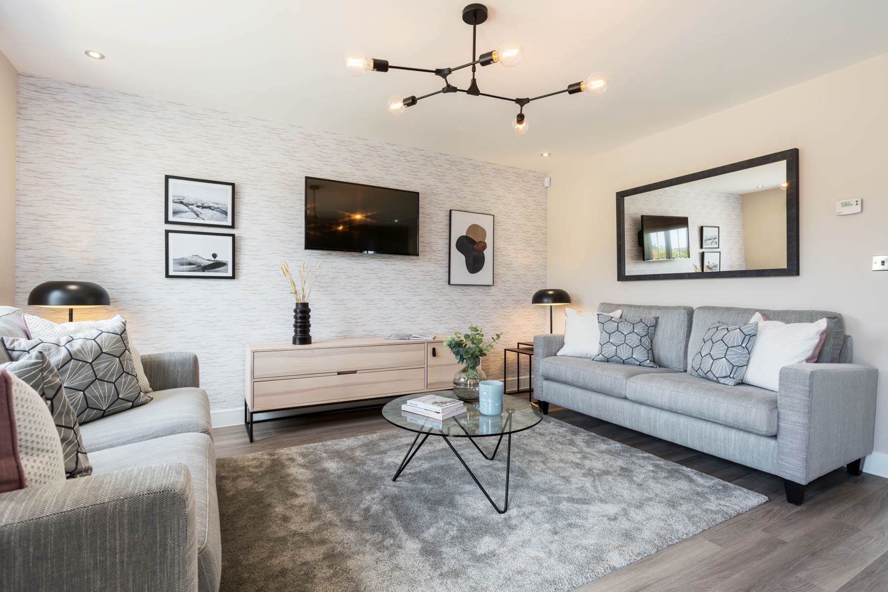 Lounge with sofas and TV