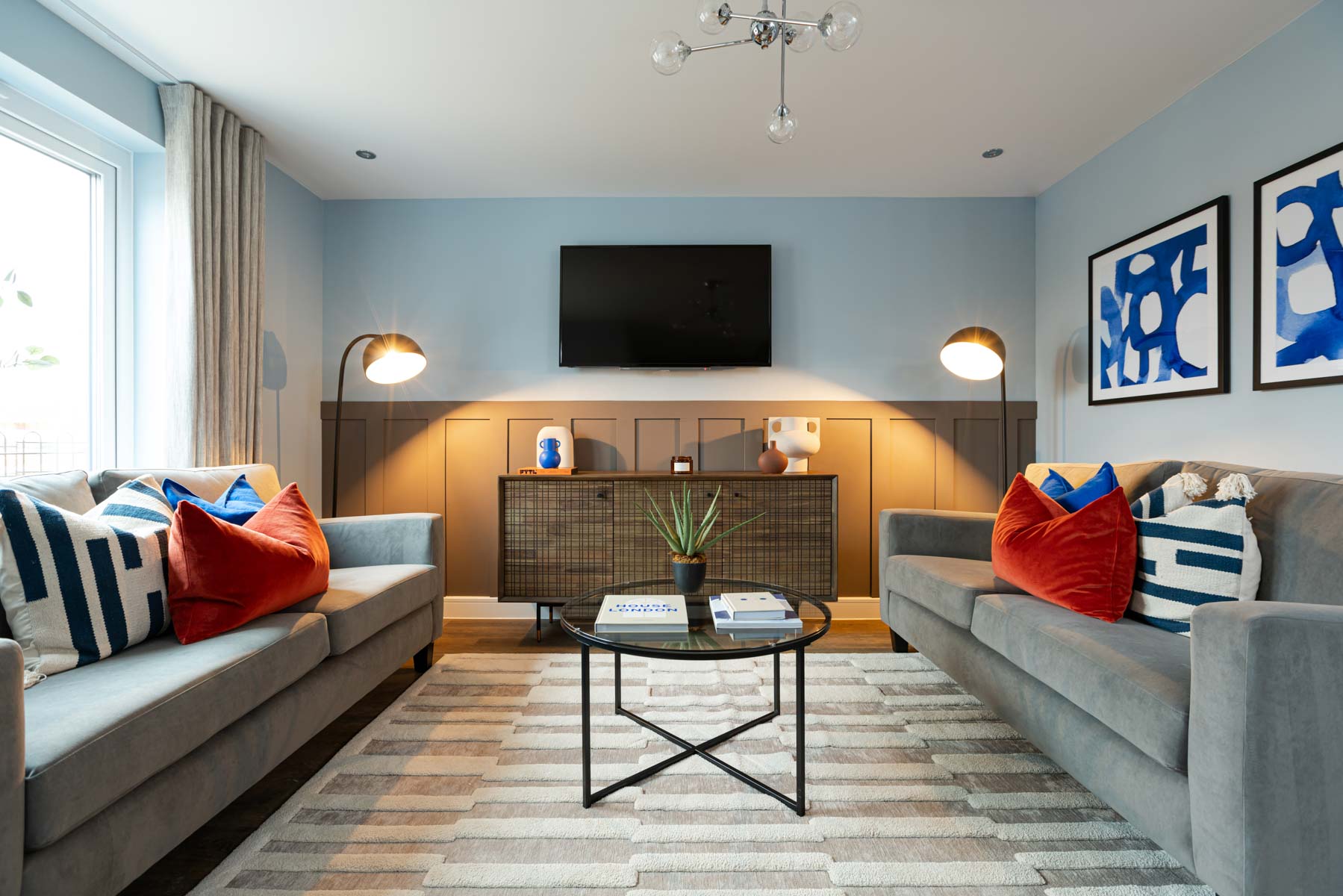 Sofas with coffee table and TV