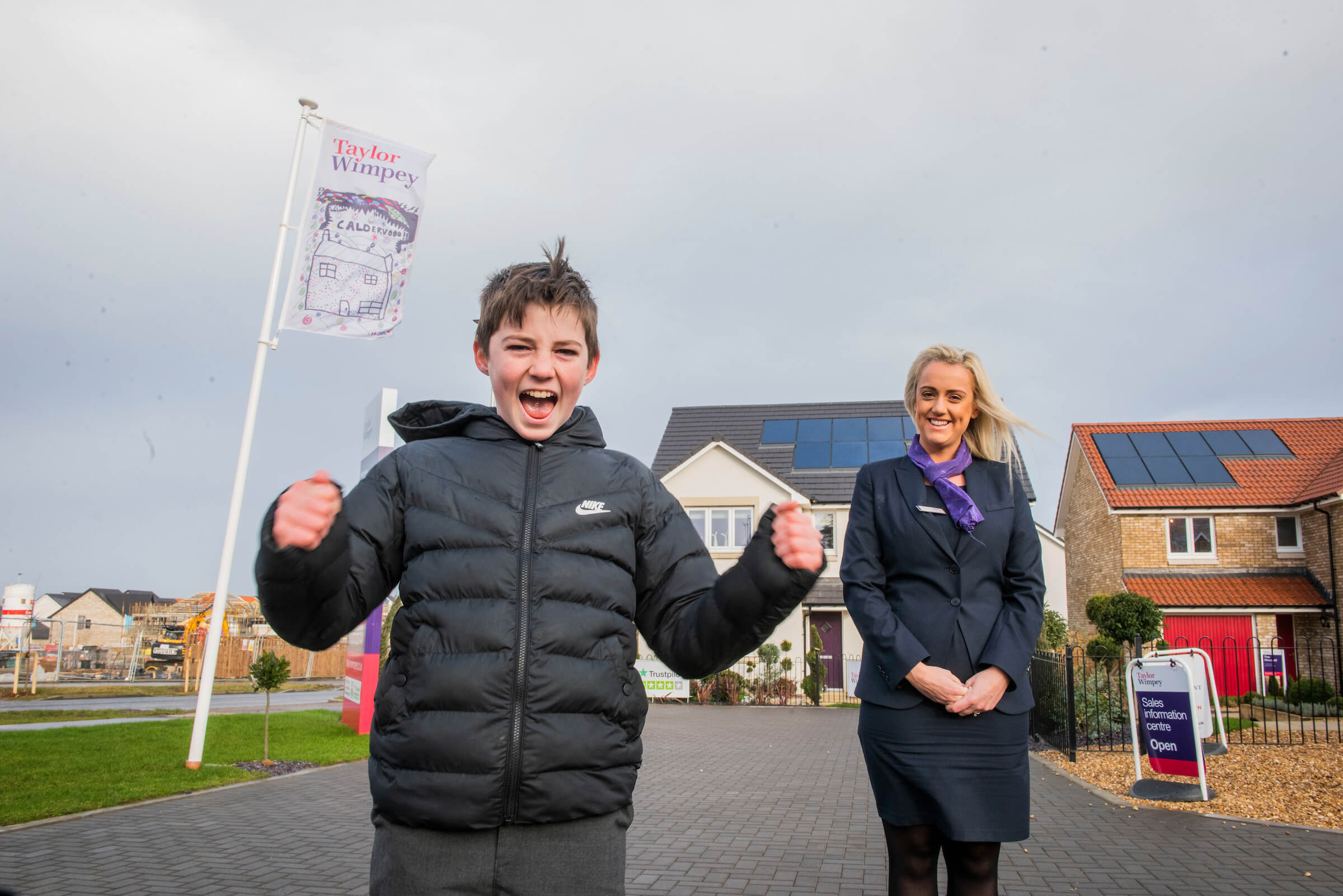 Calderwood primary school pupil flag winner and sales executive