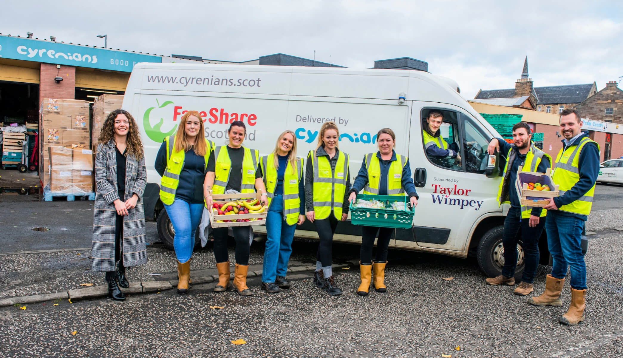 Taylor Wimpey staff giving a helping hand at the food bank warehouse