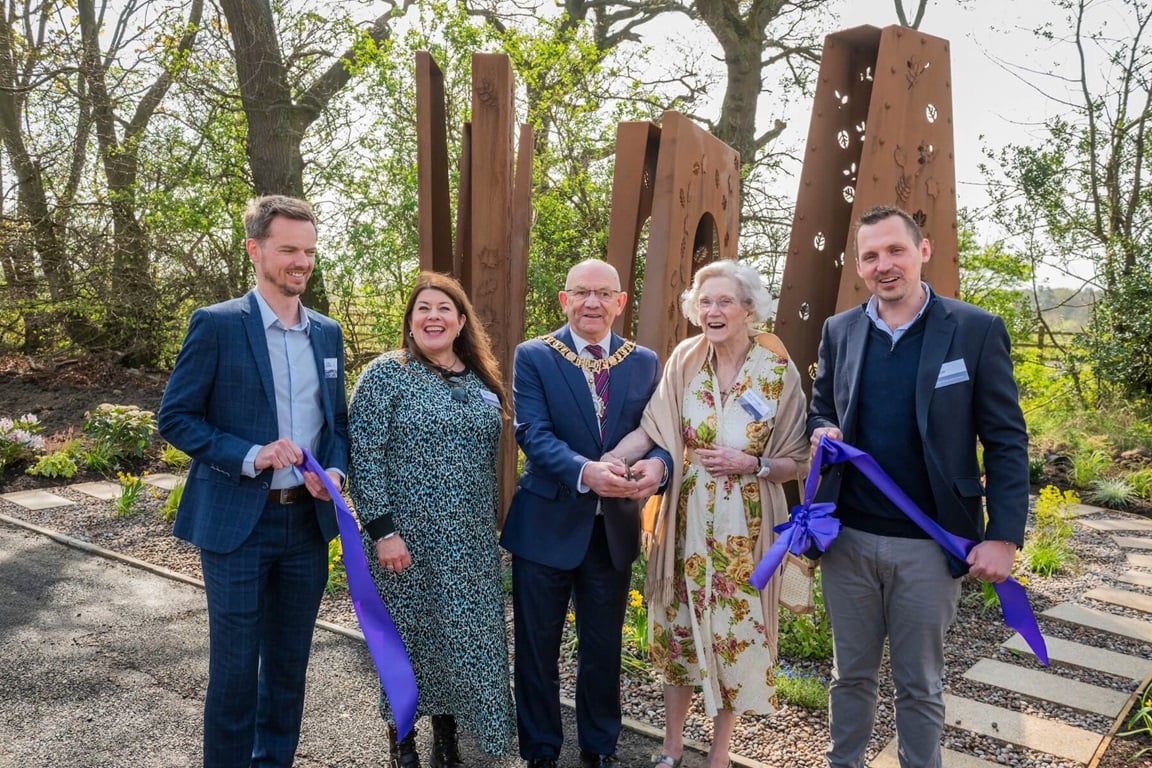 Jordan Howieson (Senior Architectural Technician), Pauline Mills (Technical Director), The Lord Provost Robert Aldridge, Mrs Elizabeth Grubb, and Phil Cooper (Land and Planning Director) at the opening of the new public artwork at Hawthorn Gardens.
