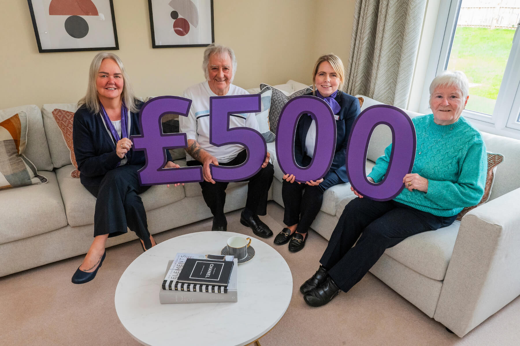 Taylor Wimpey’s sales executives Donna Koch and Natalie Holm, based at its Ravensheugh development at St Clements Wells in Wallyford, along with Wallyford Community Council representatives – Beryl Stevenson (Treasurer) and Jim McLean (Community Counsellor)