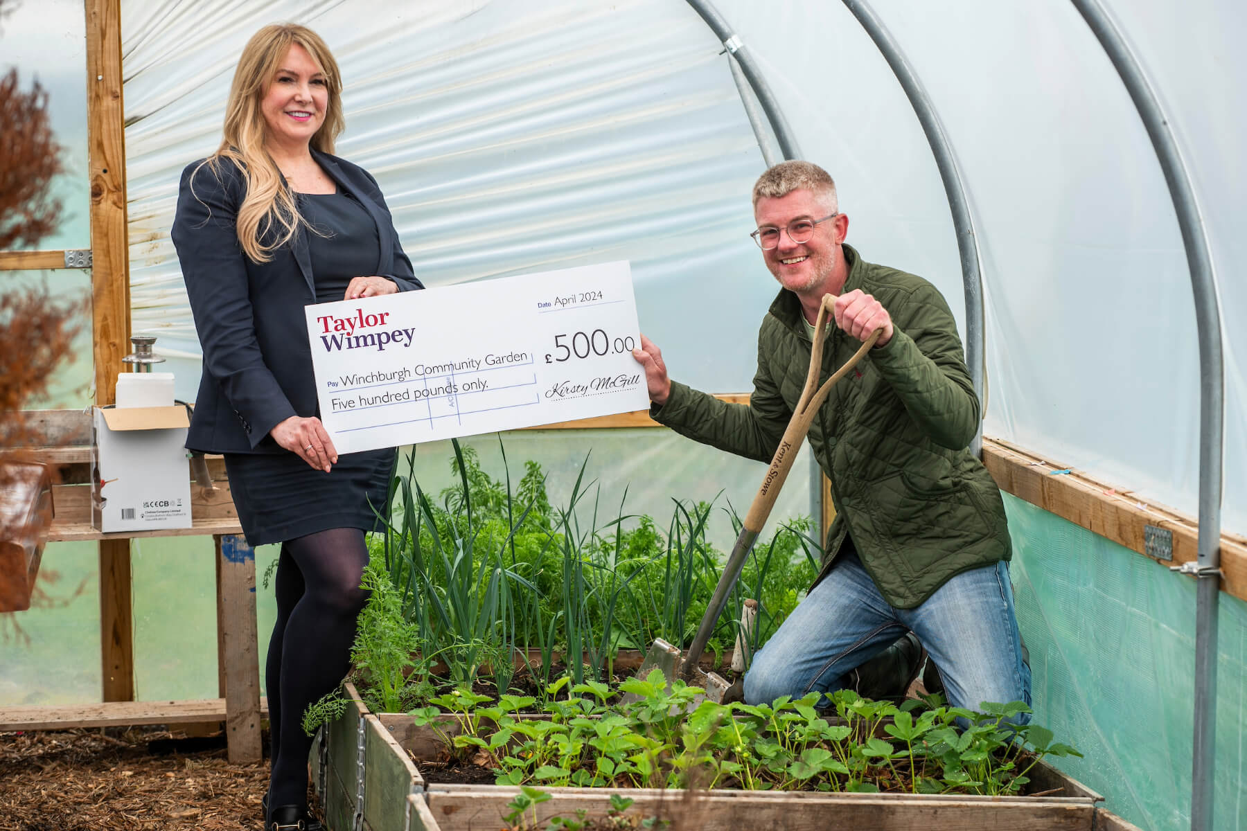 Winchburgh Community Growing Group volunteer – and Head Winchburgh Womble, Aileen Murdoch) and John West (Chairman & co-founder) - with local Taylor Wimpey sales executive Isla Lucey. 