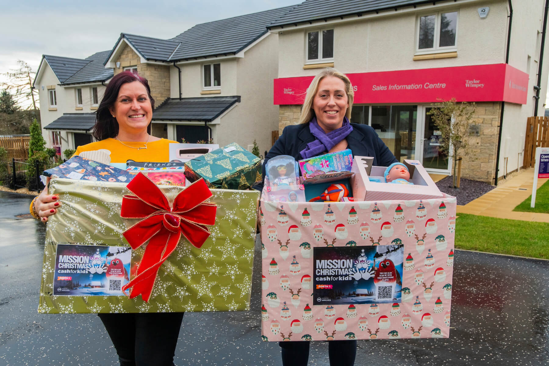 Taylor Wimpey Staff with presents for mission christmas