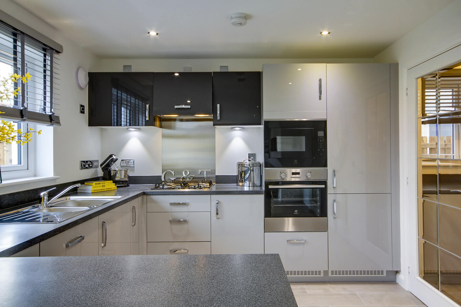 The kitchen and utility in the Lewis home