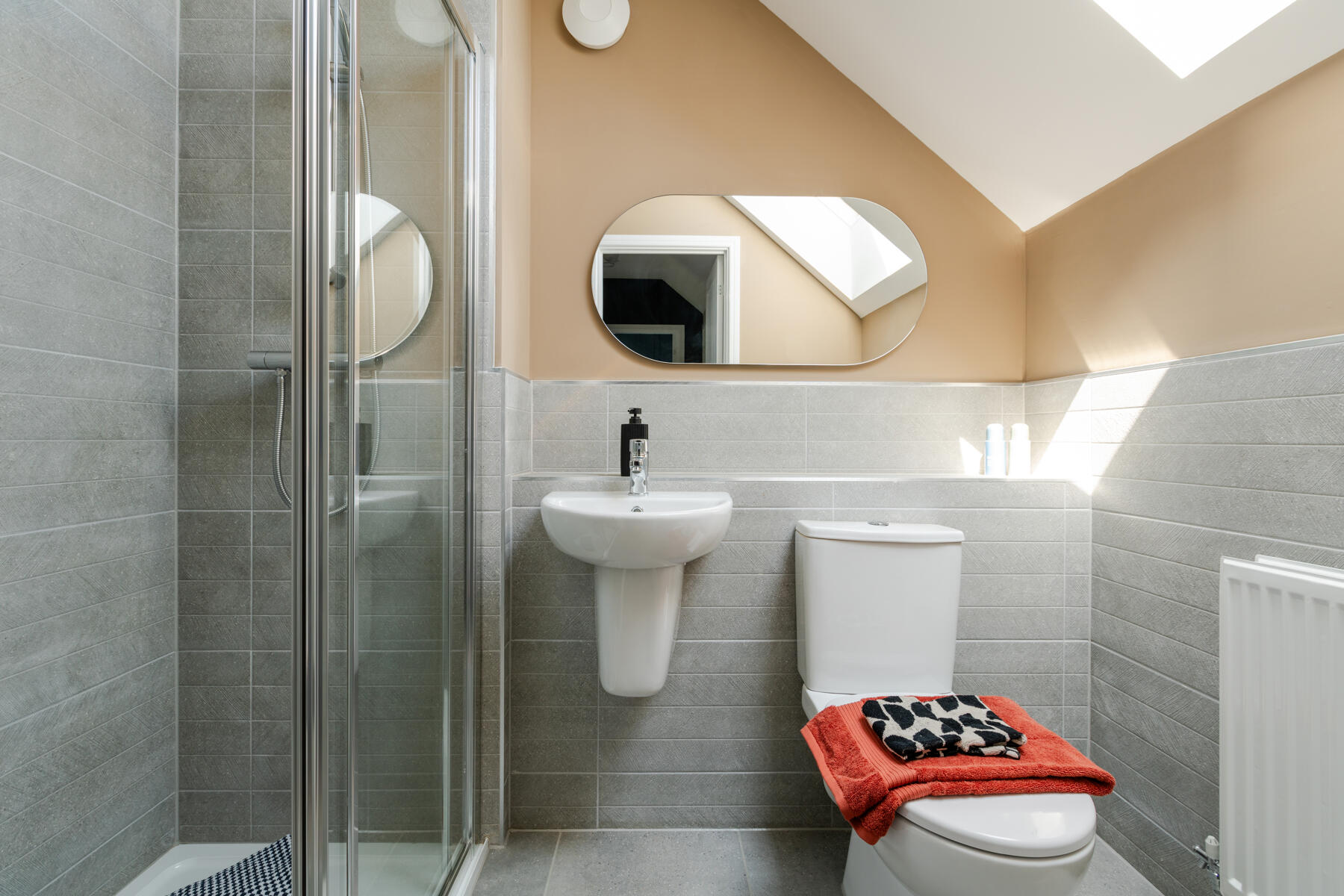 The top floor is complete with a shower room