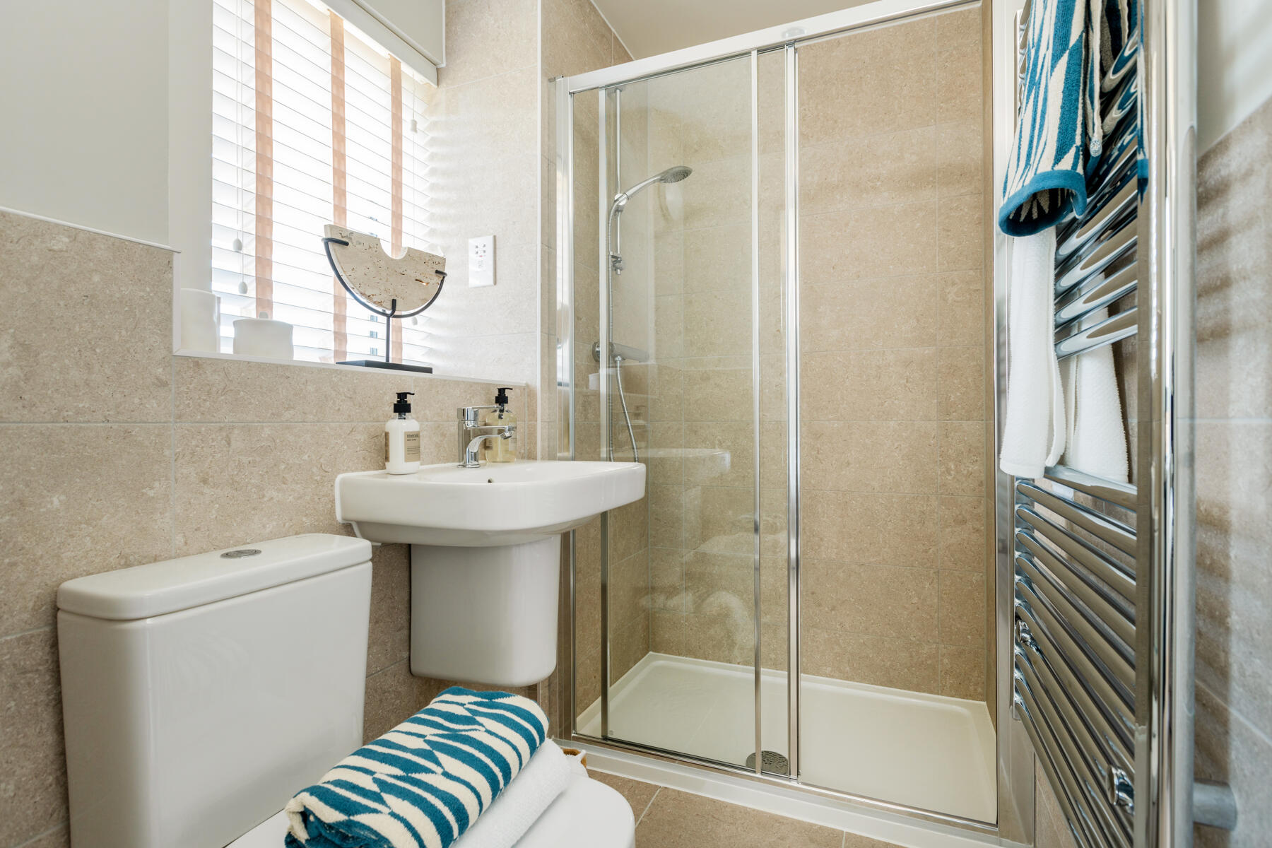 Bedroom 1 also features a private en suite shower room