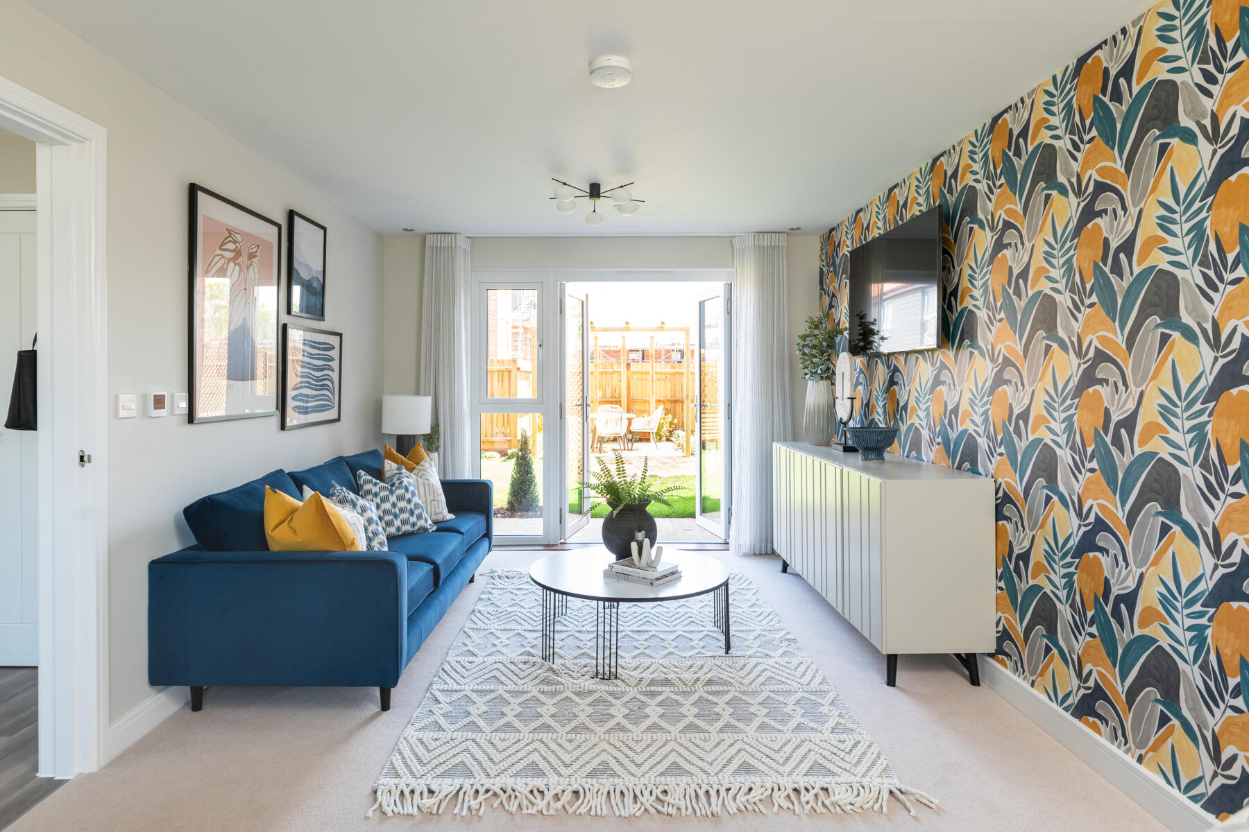 The dual aspect living room also benefits from French doors