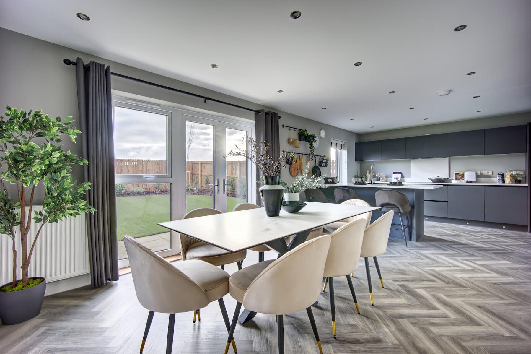 A sociable dining area with French doors to the rear garden