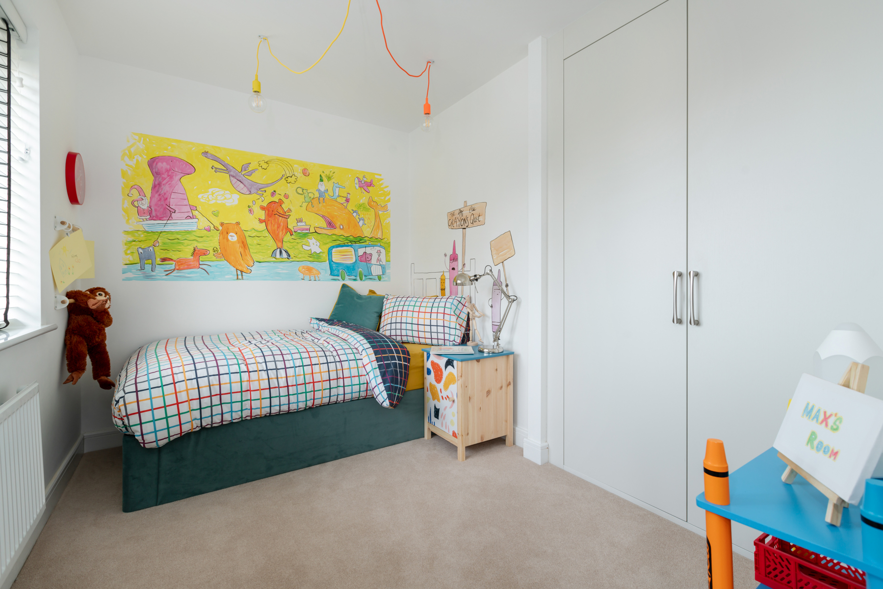 Bedroom four is styled on the book 'The Day The Crayons Quit'