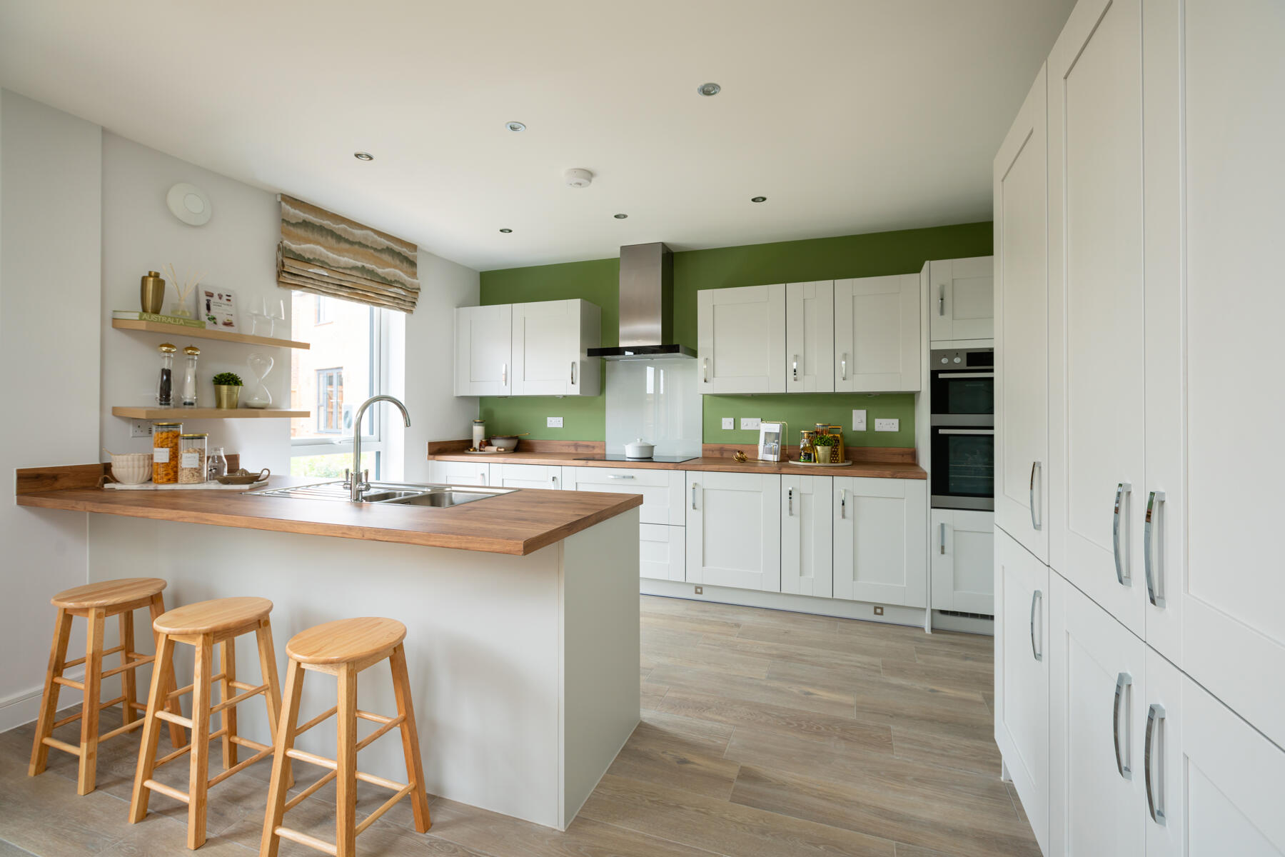 Modern kitchen with ample storage and sociable breakfast bar