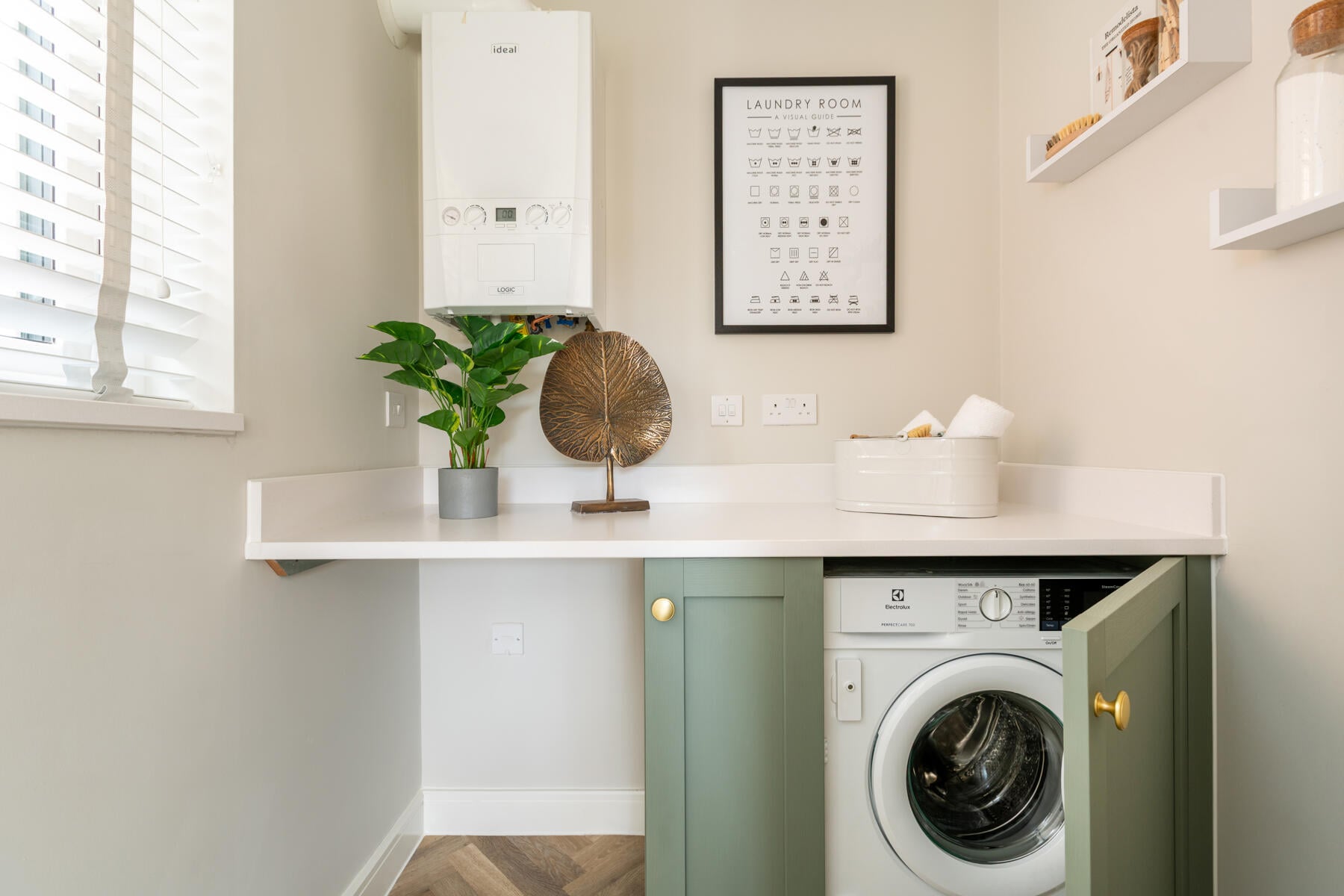 Keep laundry out of sight with this utility room