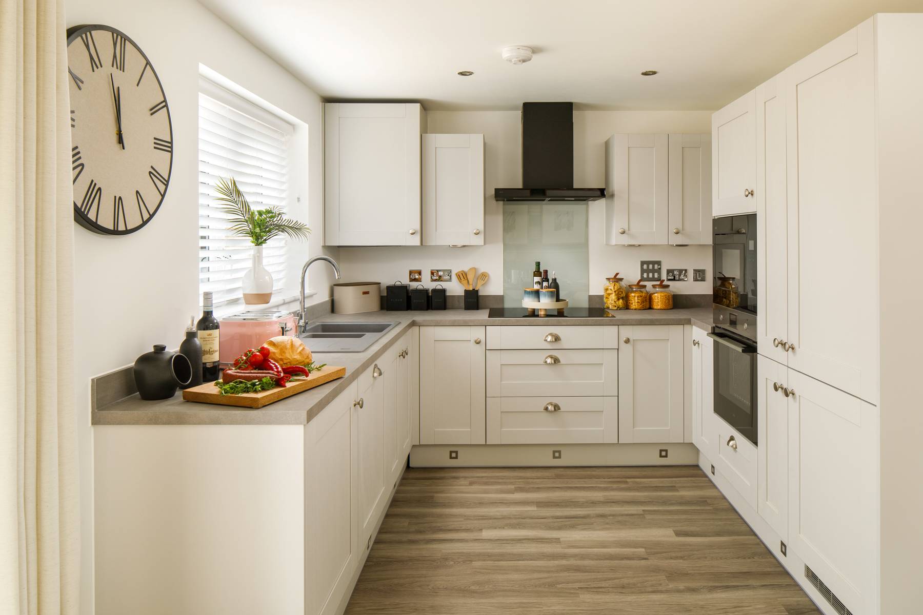 Perfectly designed kitchen with windows to the garden