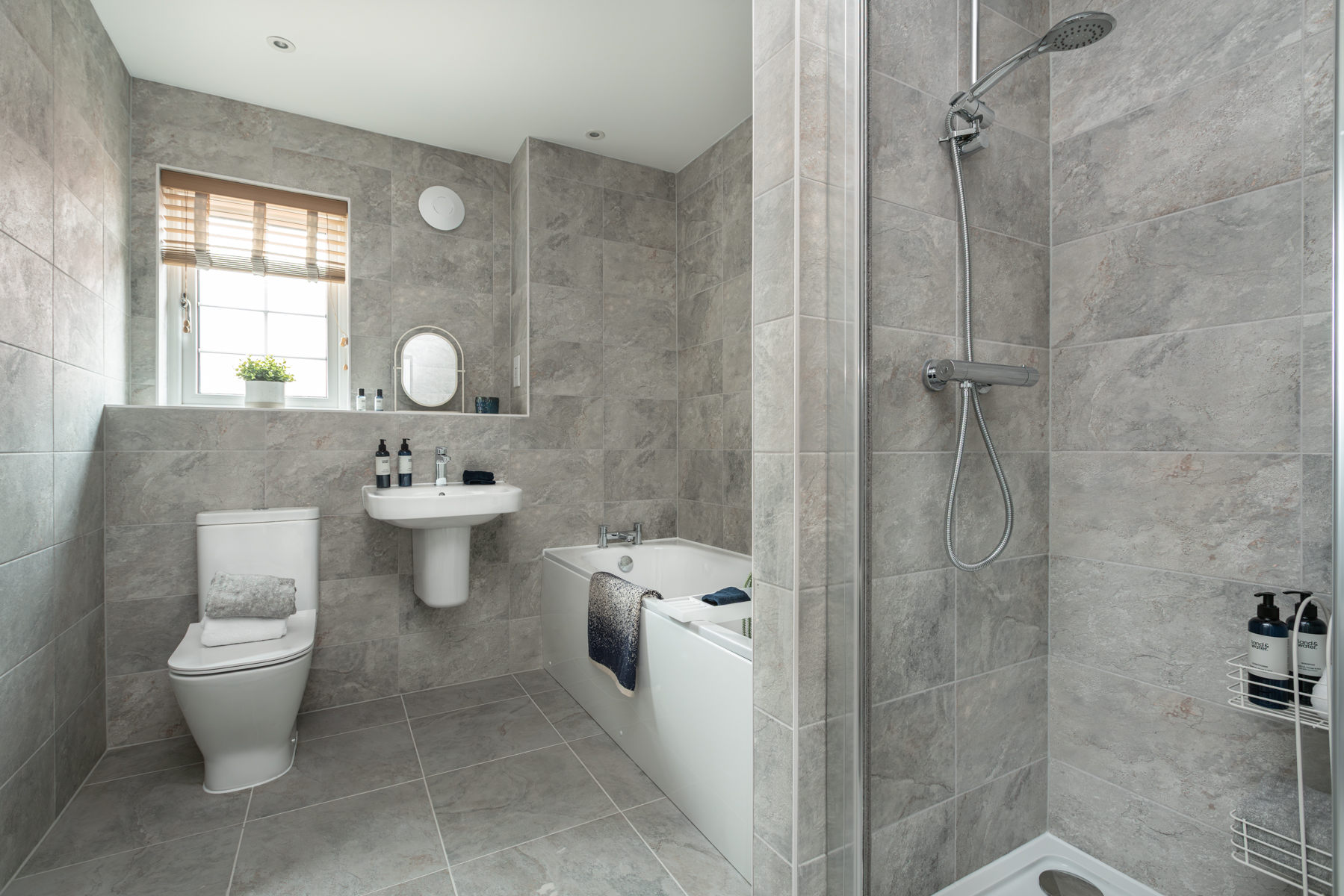 A bath & separate shower offer convenience