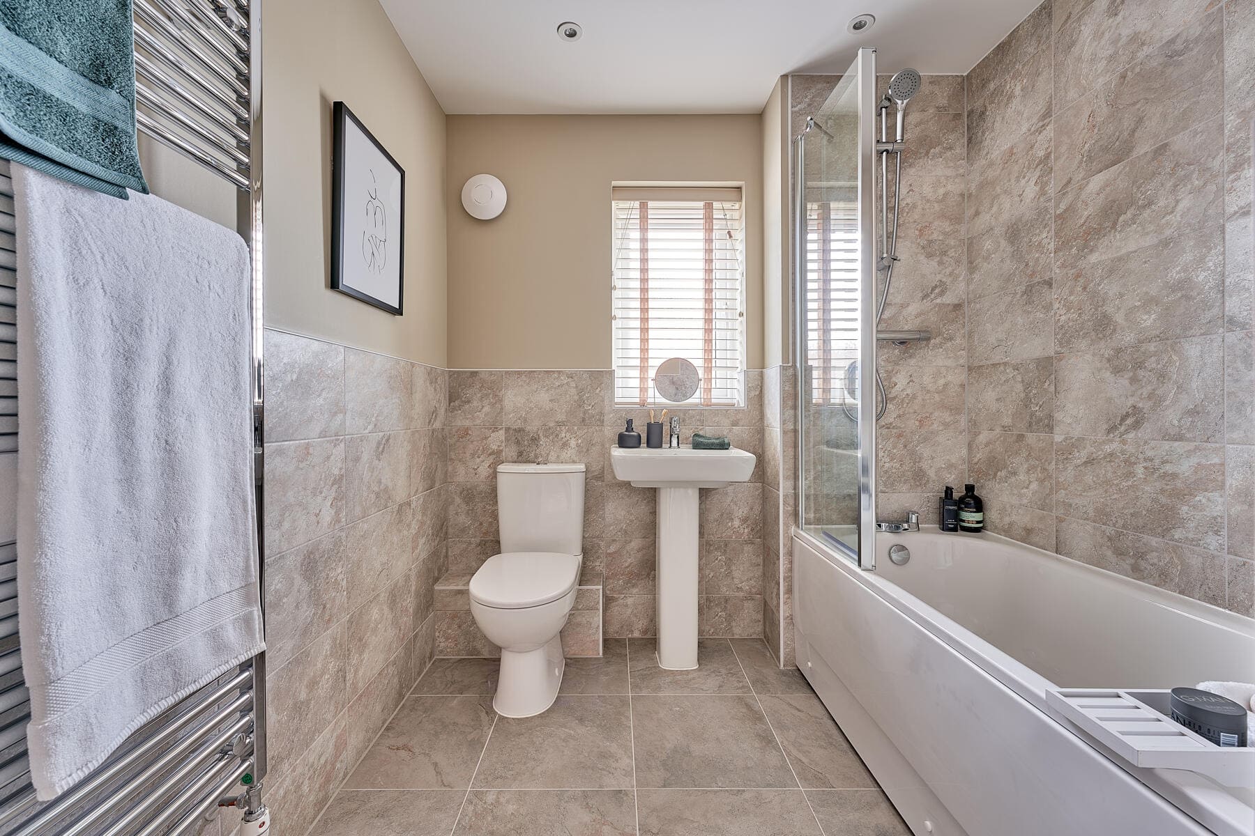 Bathroom with shower over the bath