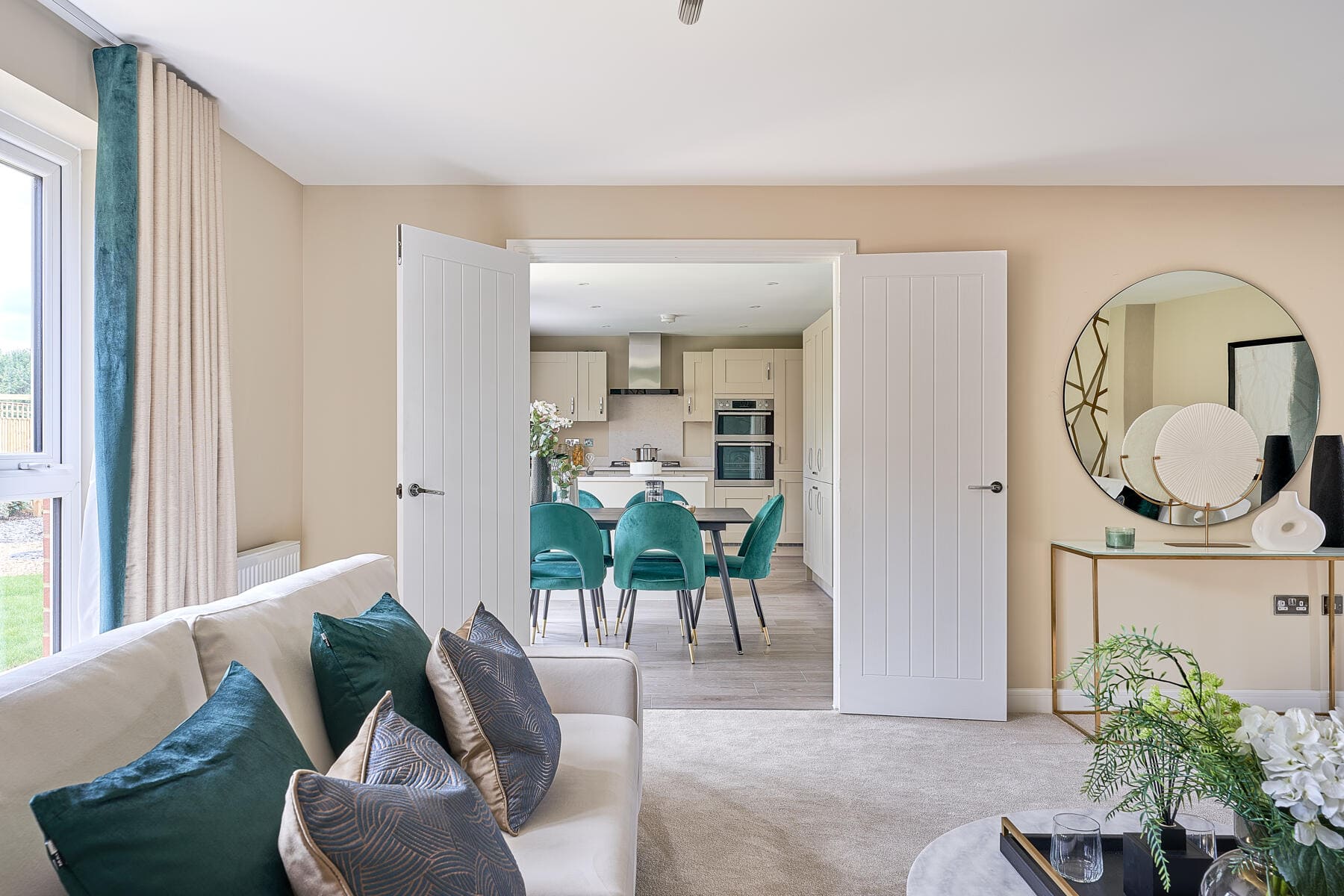 Lounge with double doors to kitchen