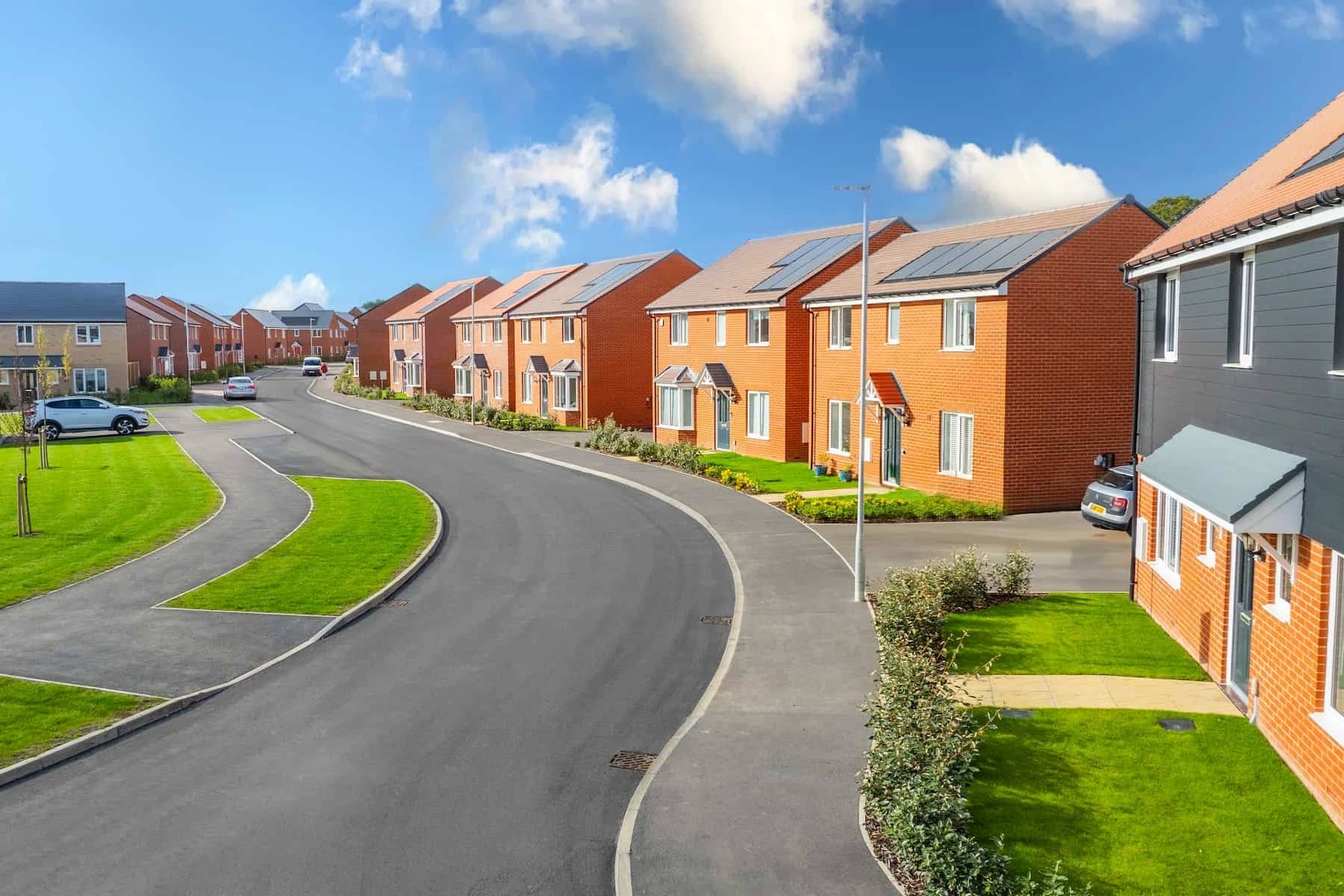 Featuring EV charging, walkable links to village amenities, and protected green space.