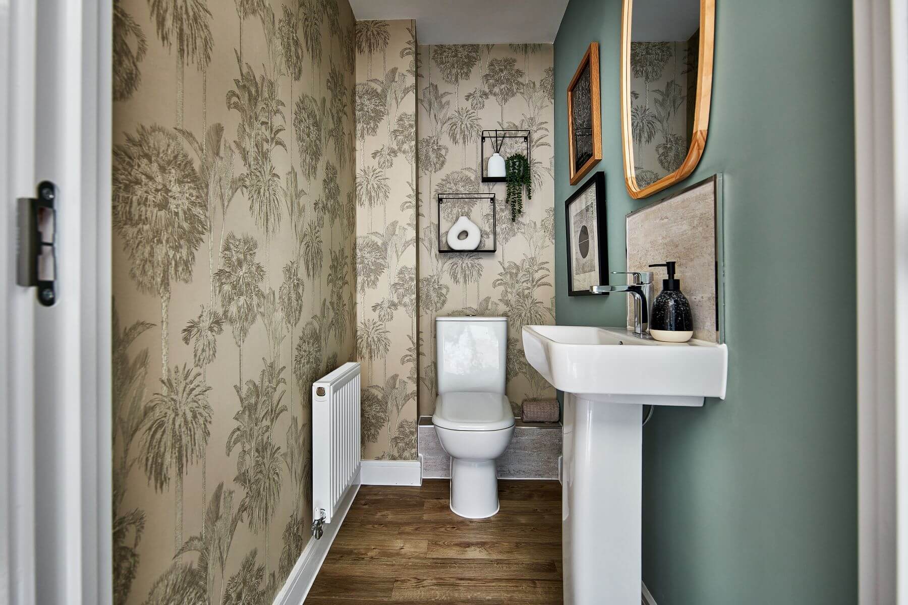 A handy downstairs toilet sits in the centre of the home