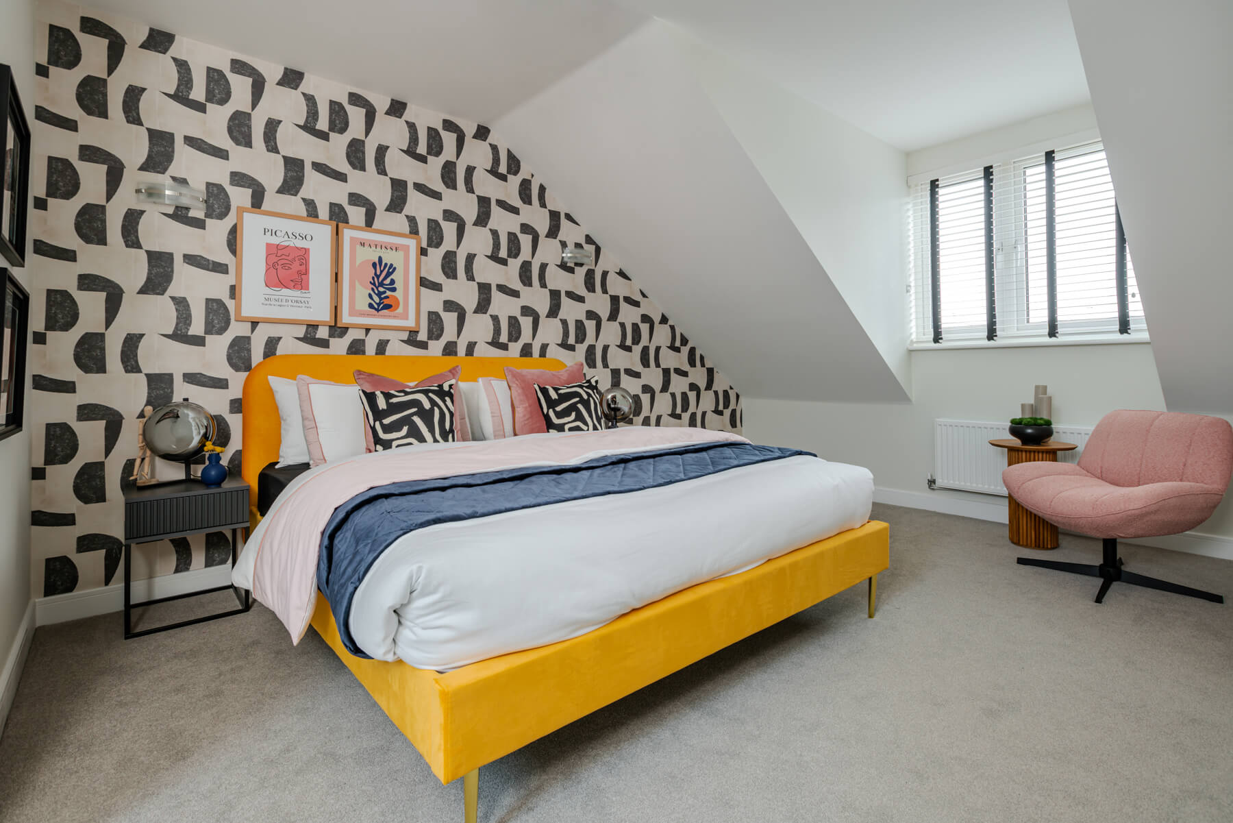 Bedroom 2 is a spacious room that spreads across the whole top floor