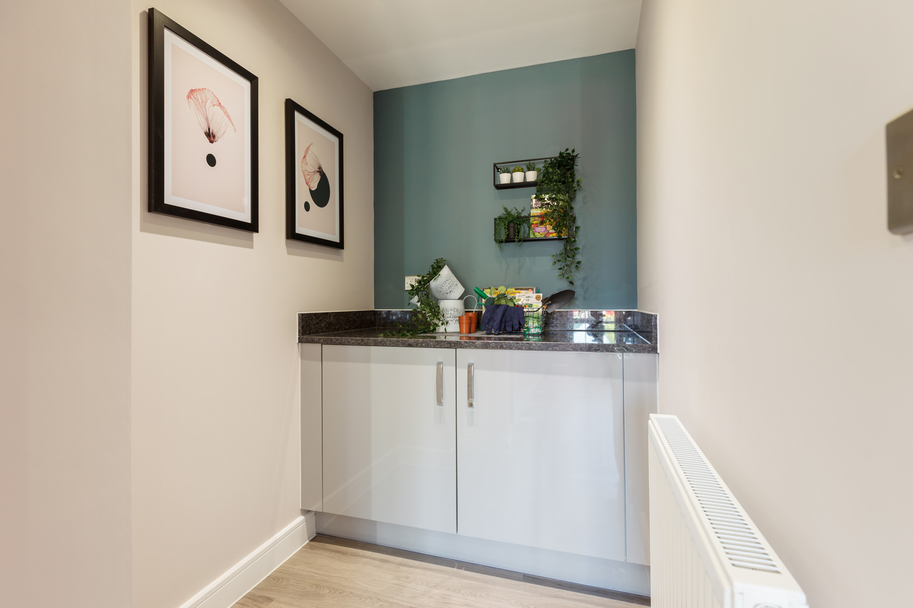 A separate utility space is connected to the kitchen