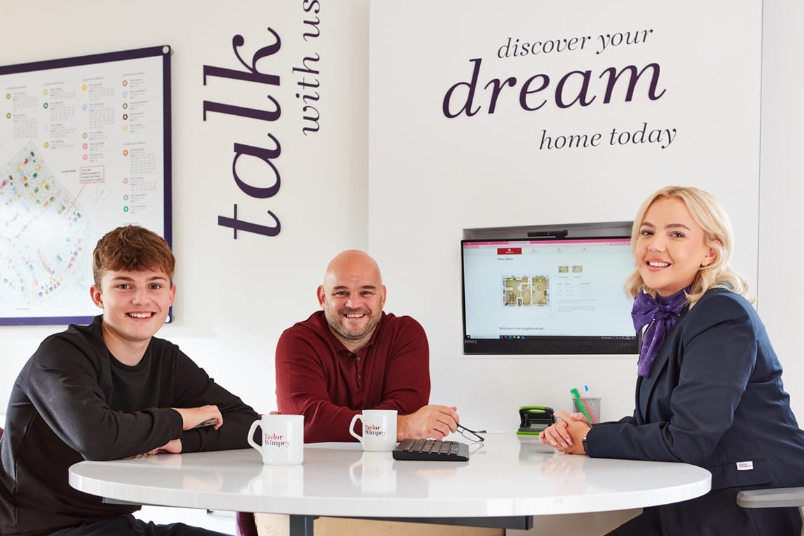 Taylor Wimpey staff and customer