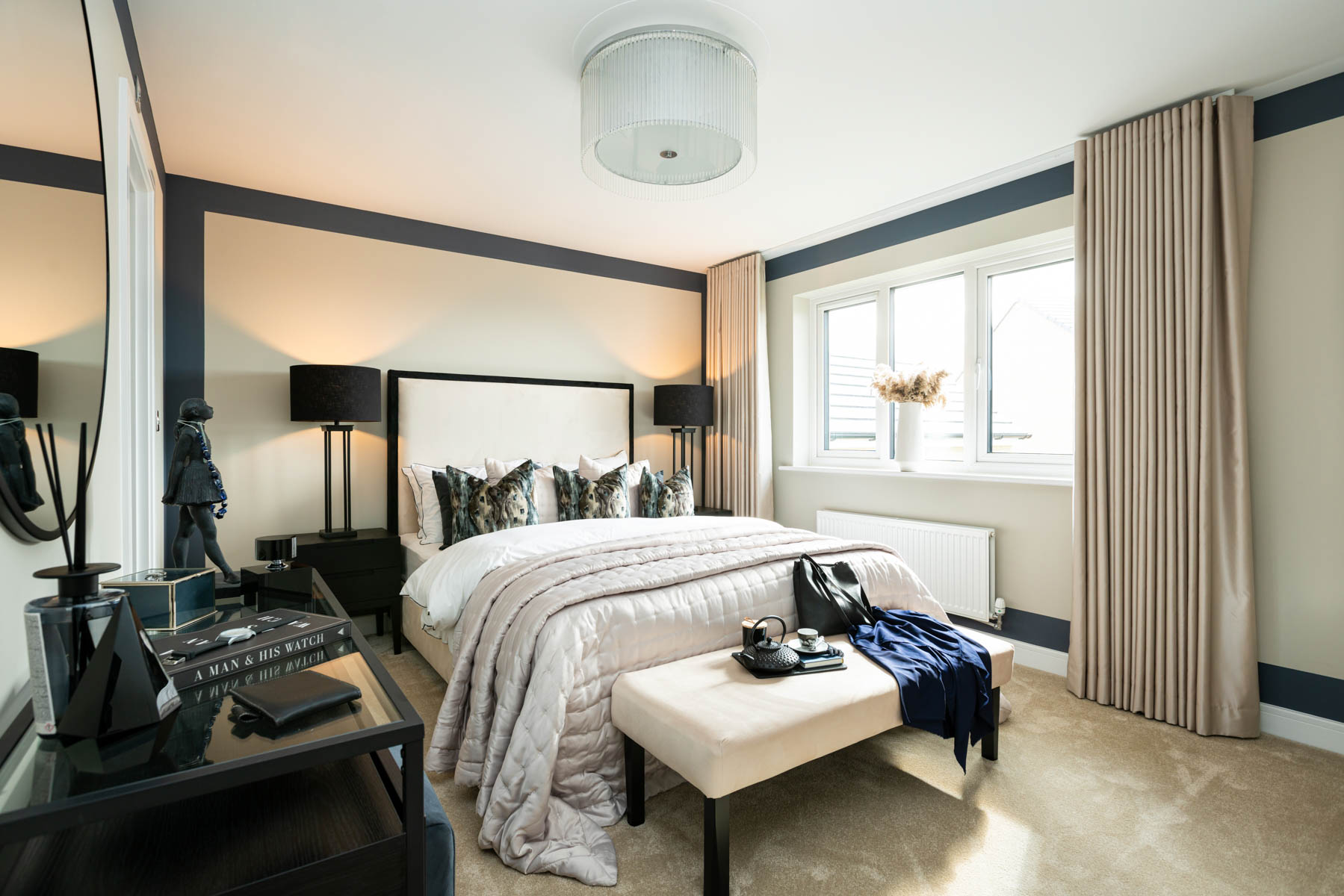 Grand main bedroom which overlooks the rear garden