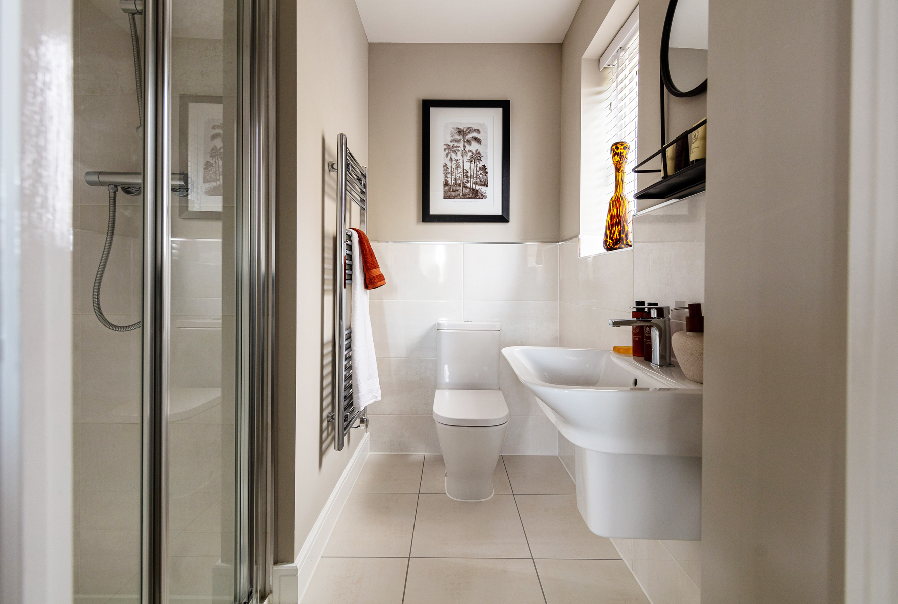 The main bedroom boasts an en-suite shower room