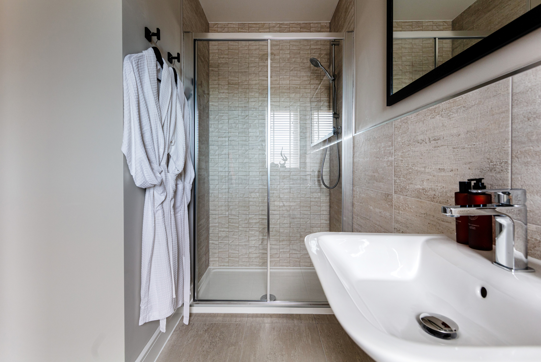 The second bedroom also boasts an en-suite shower room