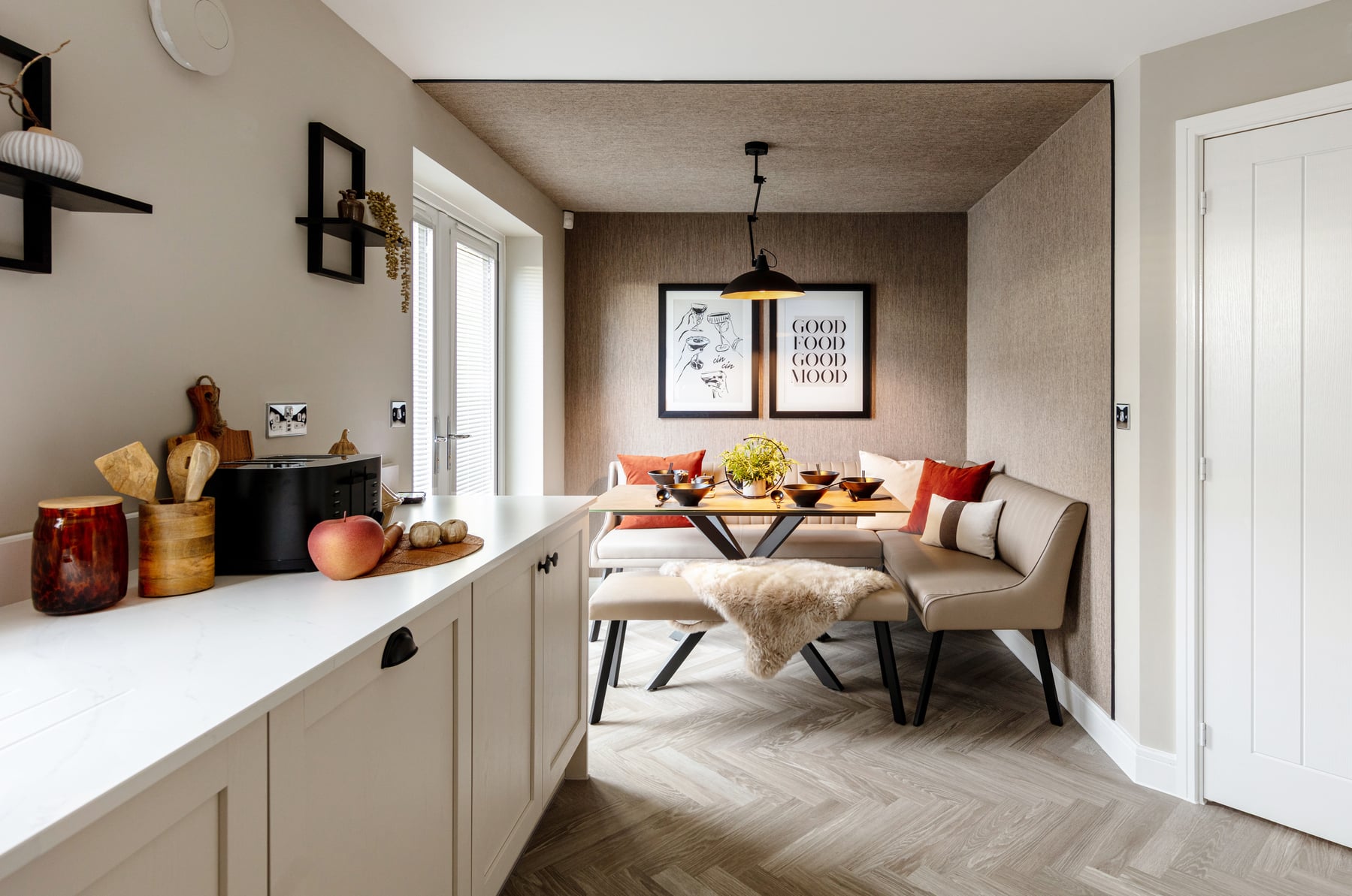 French doors open from the dining area to the rear garden
