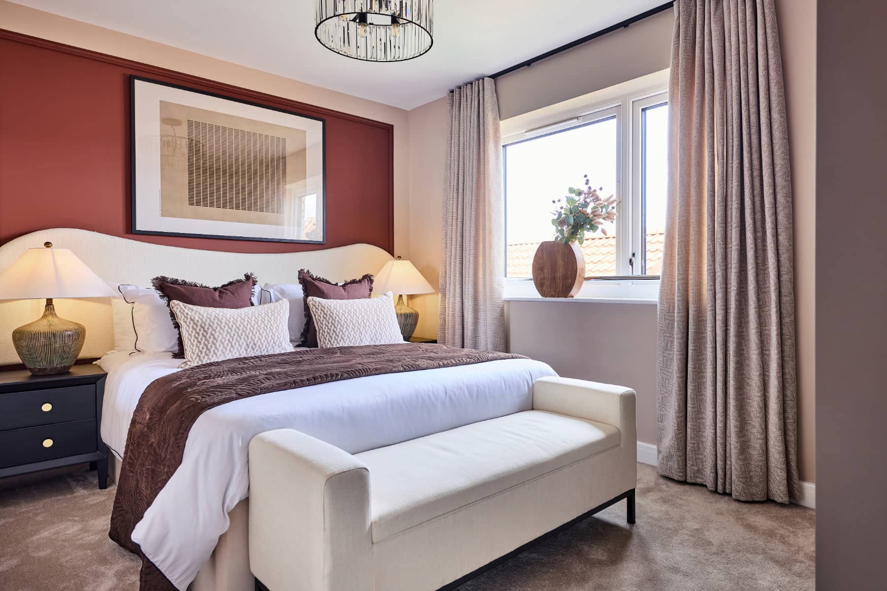 A bright and spacious bedroom with room to unwind.