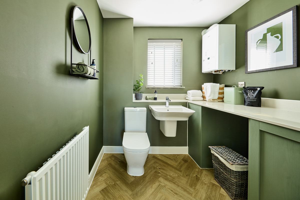 The handy utility room is perfect for keeping your laundry hidden away