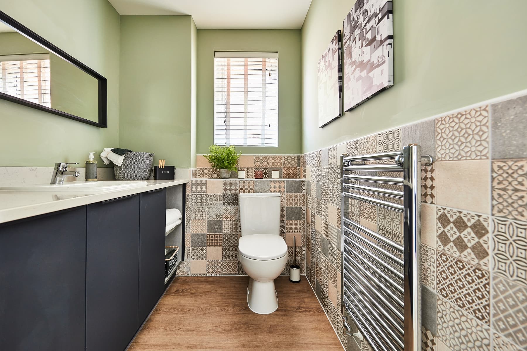A downstairs toilet and utility room adds convenience